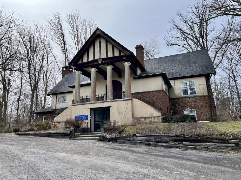 A former parish hall at All Saints' Episcopal Church in West Newbury. The new resettlement organization is looking at developing three to five units of housing for forcibly displaced families on the property. (Lynn Jolicoeur/WBUR)