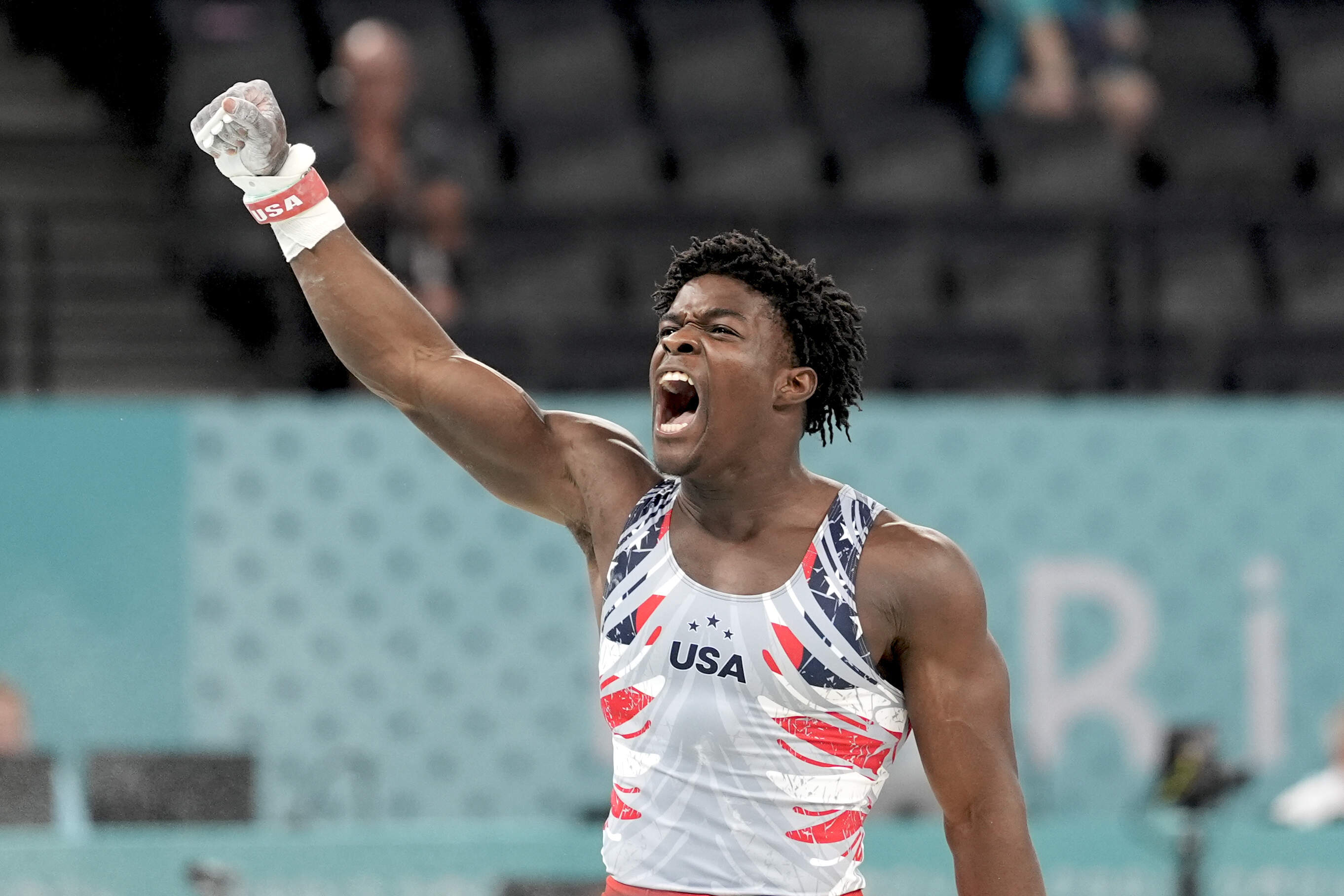 Frederick Richard, of the United States, reacts after performing on the rings during the men's artistic gymnastics team finals round at the 2024 Summer Olympics. (Abbie Parr/AP)