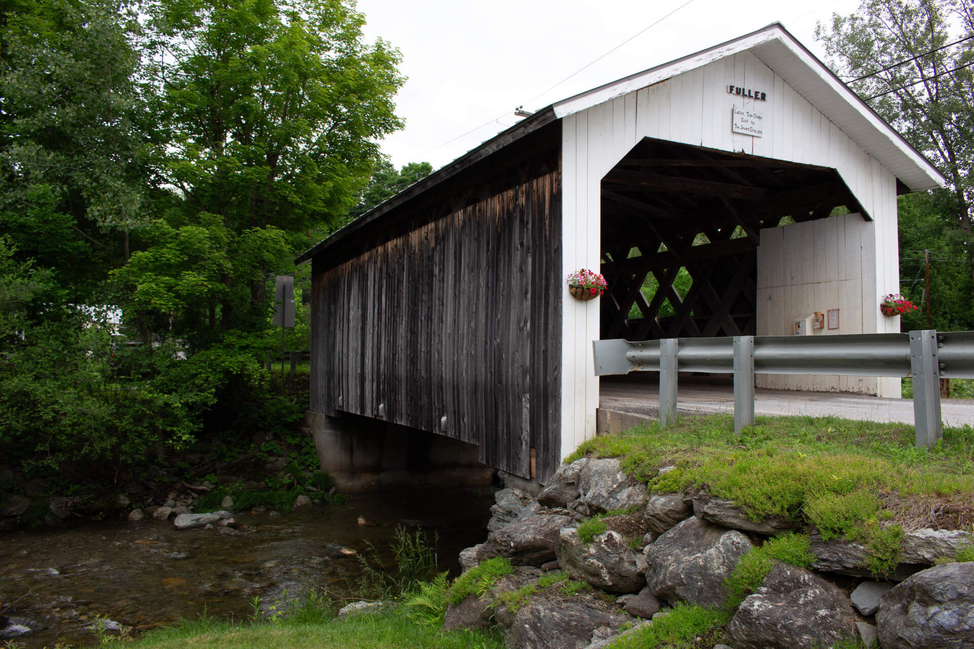 The Fuller covered bridge crosses the Black Falls Brook in Montgomery, Vermont, on June 12. (Zoe McDonald/Vermont Public)