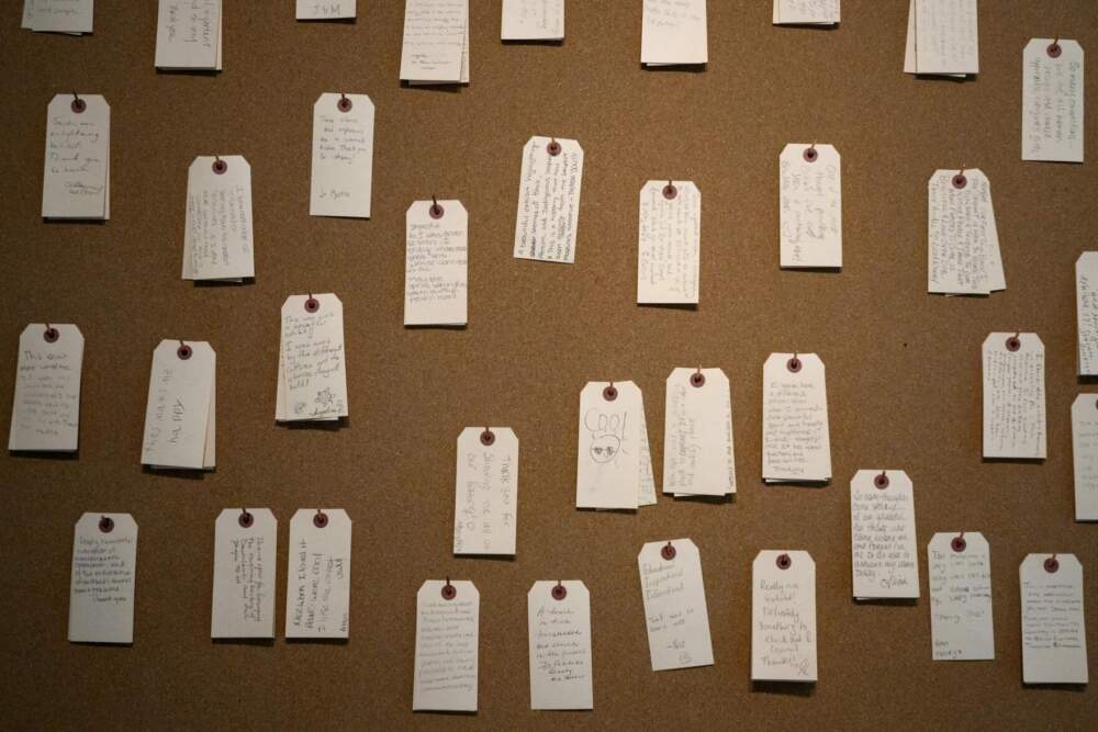 Messages left by visitors to the “Entwined” exhibition at Mystic Seaport Museum. One guest wrote that they were “driven to tears.” (Ryan Caron King/Connecticut Public)