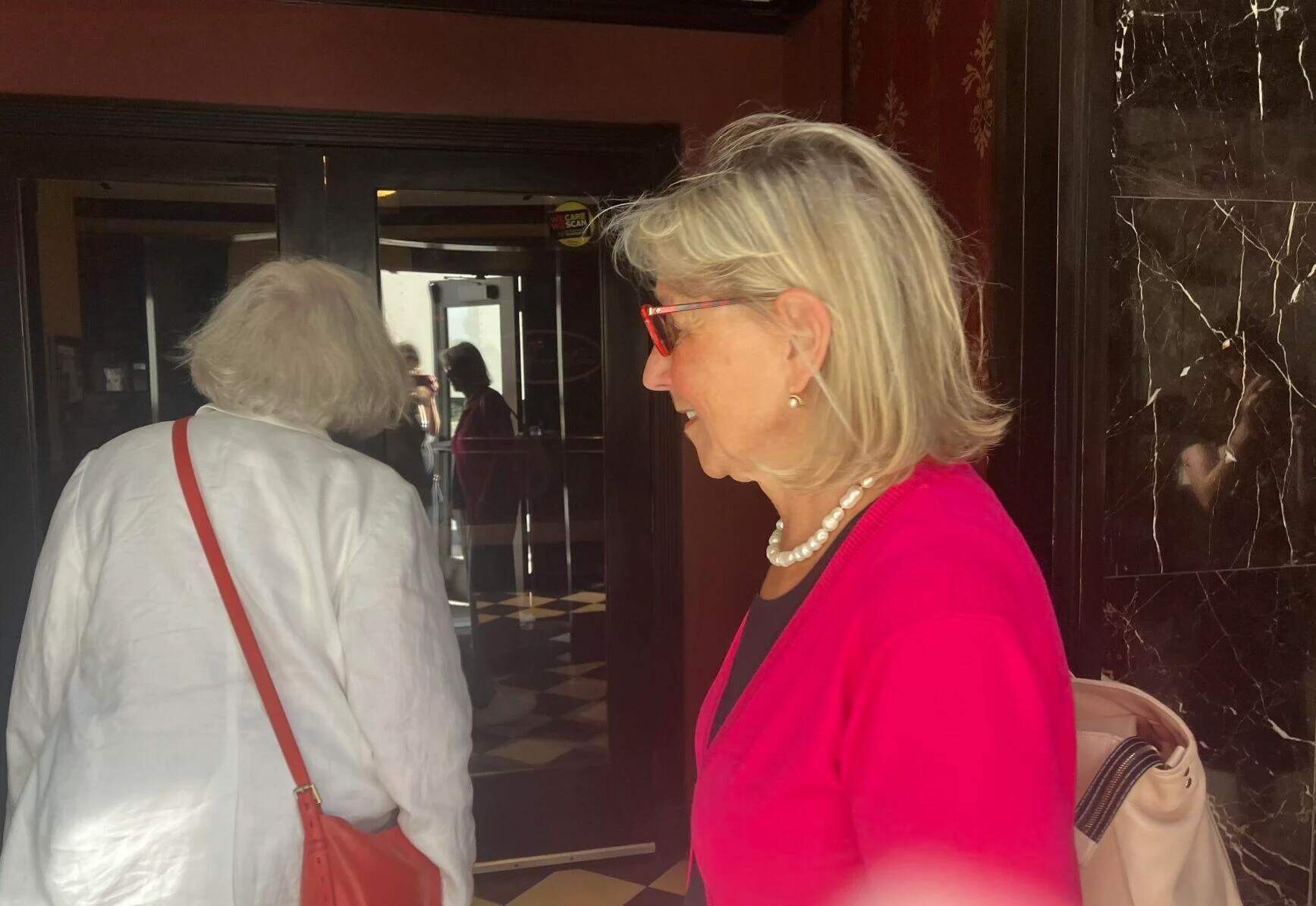 Senate President Karen Spilka enters Carrie Nation on the last day of the state Legislature's formal session. (Allison Kunitz, State House News Service)
