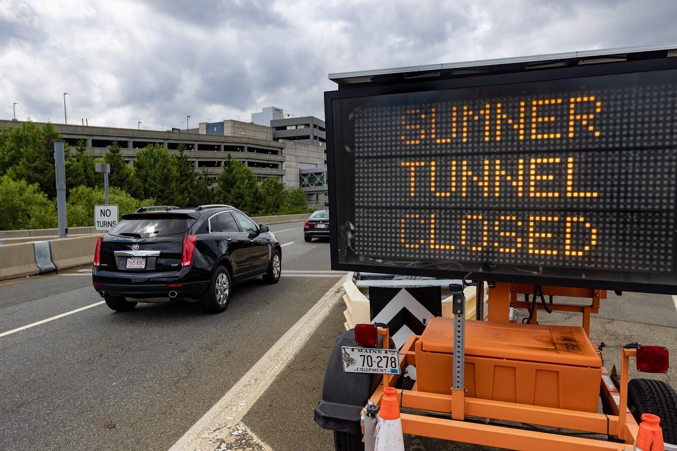 Cars lining up at the exit of Logan Airport on Airport Rd in route to the Ted Williams Tunnel. (Jesse Costa/WBUR)