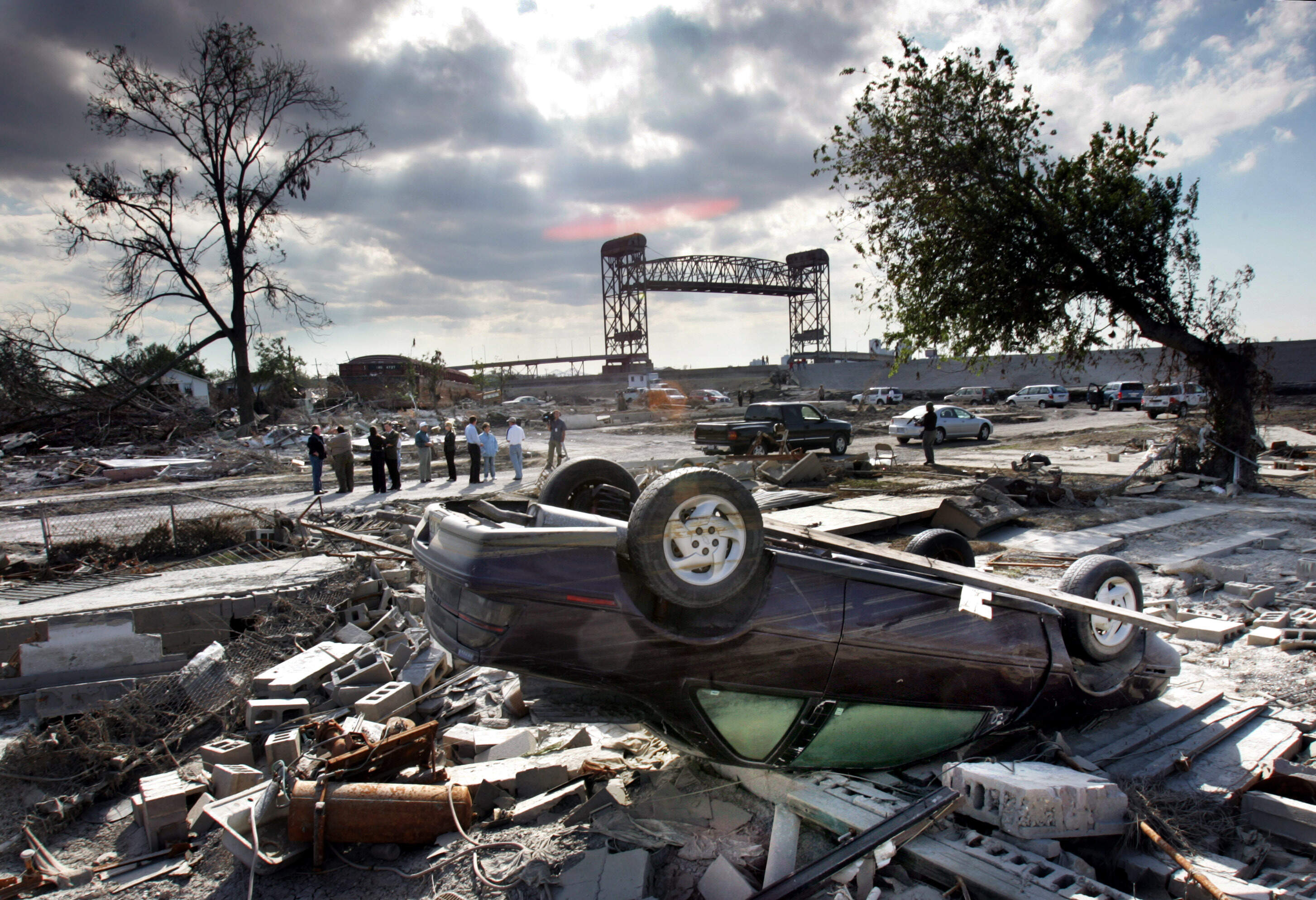 Members of the Louisiana Recovery Authority tour New Orleans' hurricane-ravaged Lower 9th Ward in 2005. (Robert F. Bukaty/AP)