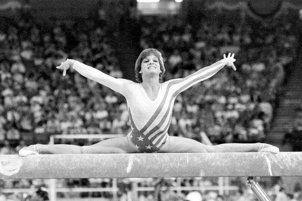 Mary Lou Retton, of the United States, performs on the balance beam during the women's gymnastics individual all-around finals at the Summer Olympics on Aug. 3, 1984, in Los Angeles. (AP Photo/Suzanne Vlamis, File)