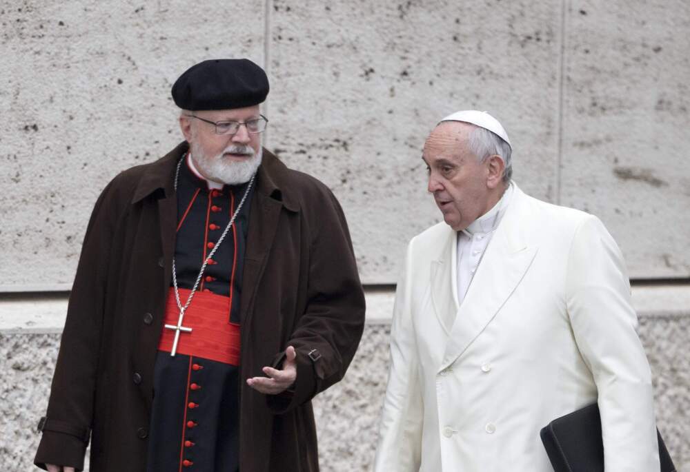 Cardinal O'Malley, left, talks with Pope Francis in 2015 (Andrew Medichini/AP Photo)