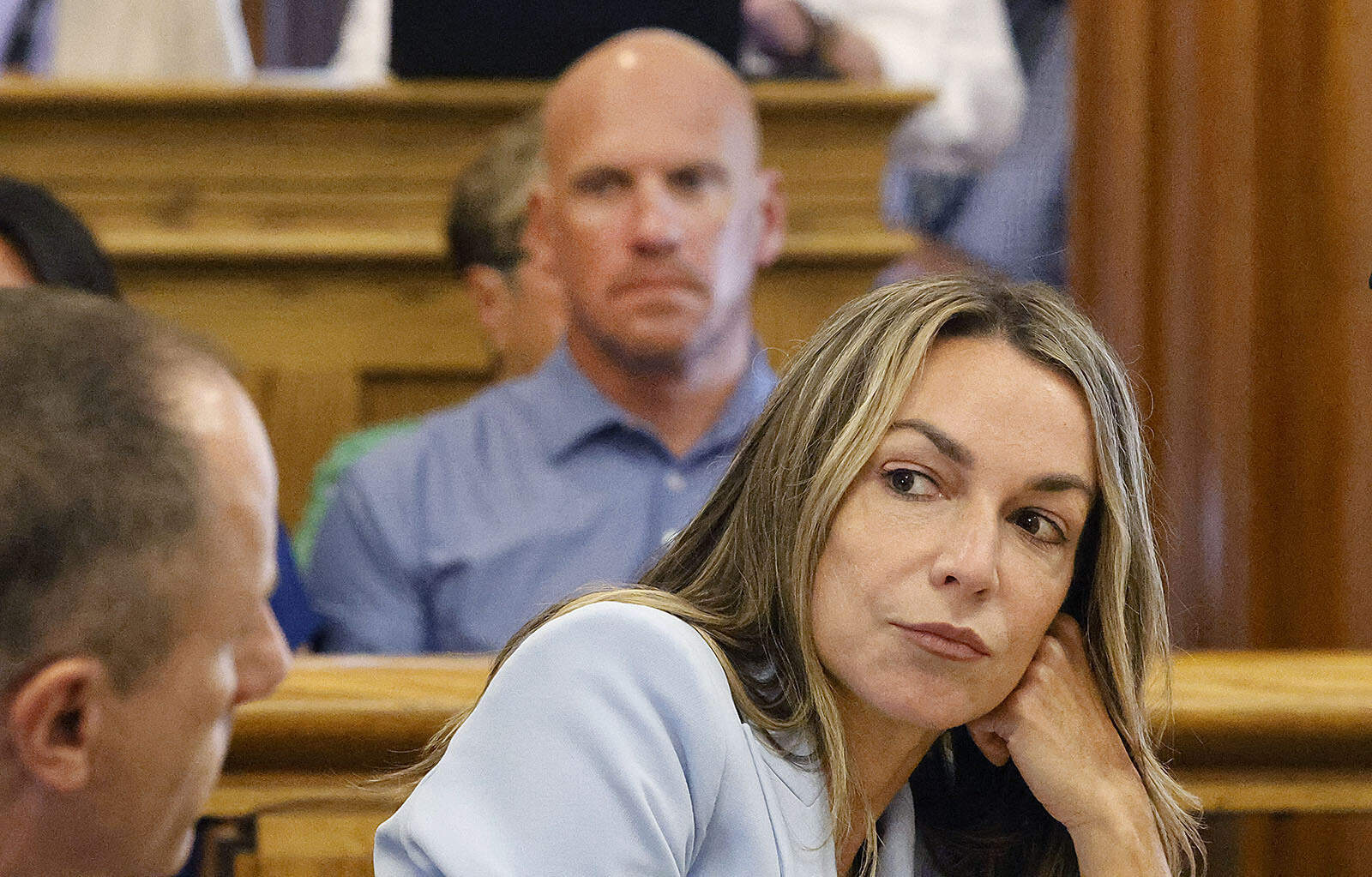 Karen Read listens to her attorney, Martin Weinberg, at Norfolk Superior Court in Dedham, on Aug. 9, 2024. (Greg Derr/The Patriot Ledger via AP, Pool)