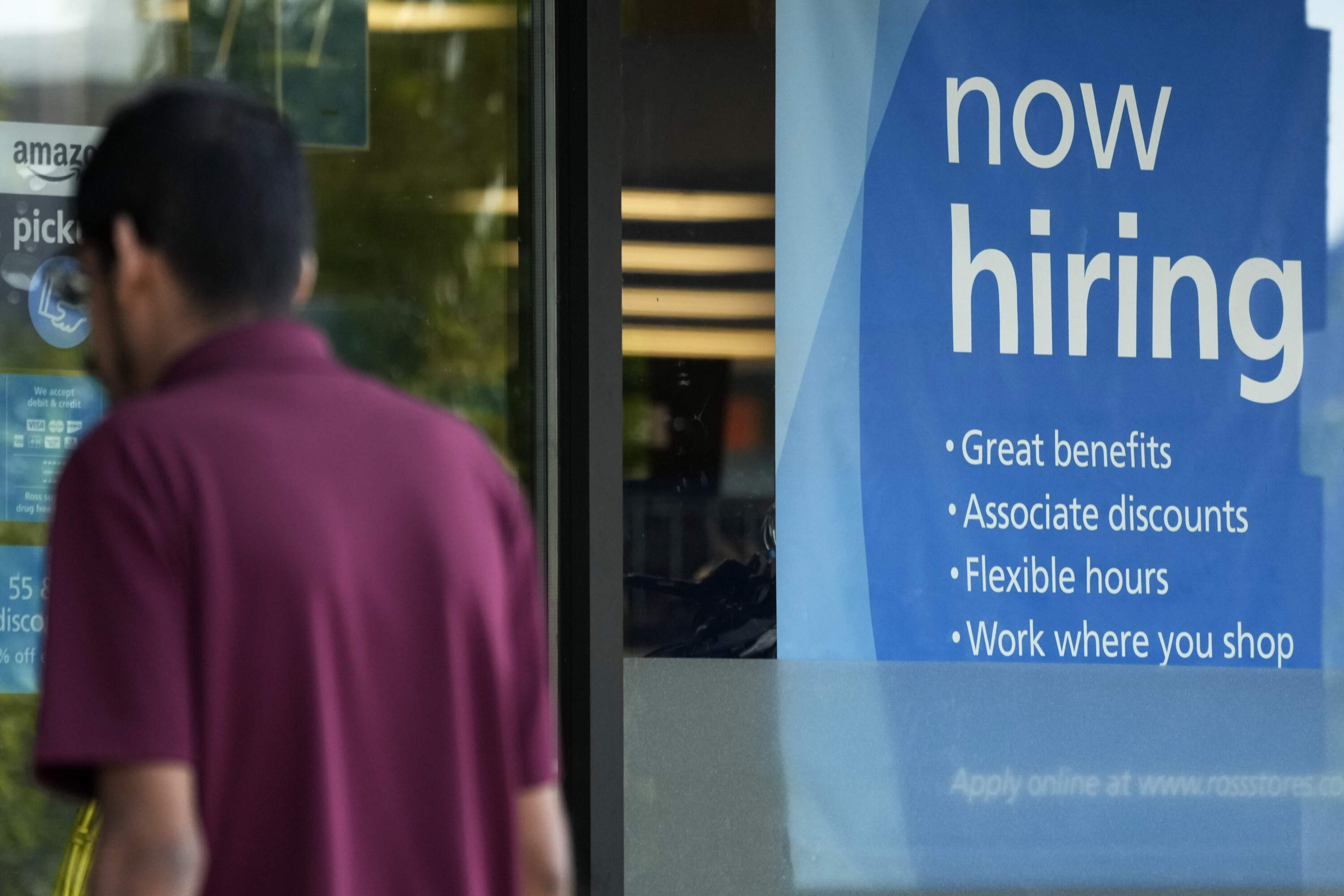 A hiring sign is displayed at a retail store in Schaumburg, Ill., July 10, 2024. (AP Photo/Nam Y. Huh, File)