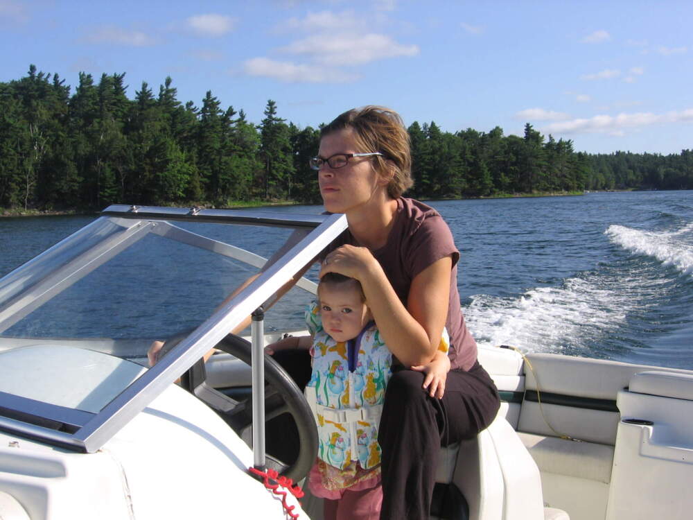 The author and her daughter on a boat on Millsite Lake in New York in 2006. (Courtesy Meaghan Shields)