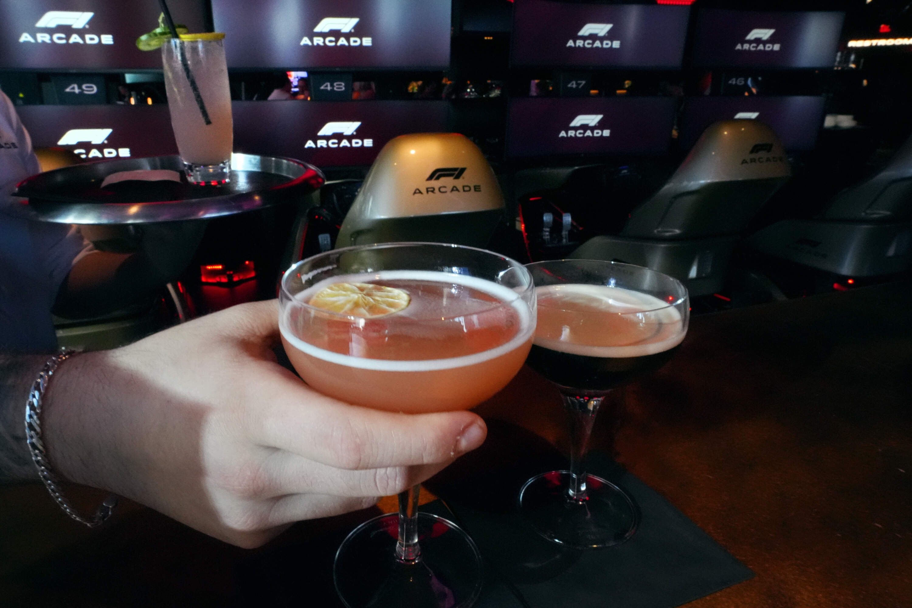 Mocktails, alcohol-free mixed beverages are served at the F1 Boston Arcade. (Charles Krupa/AP)