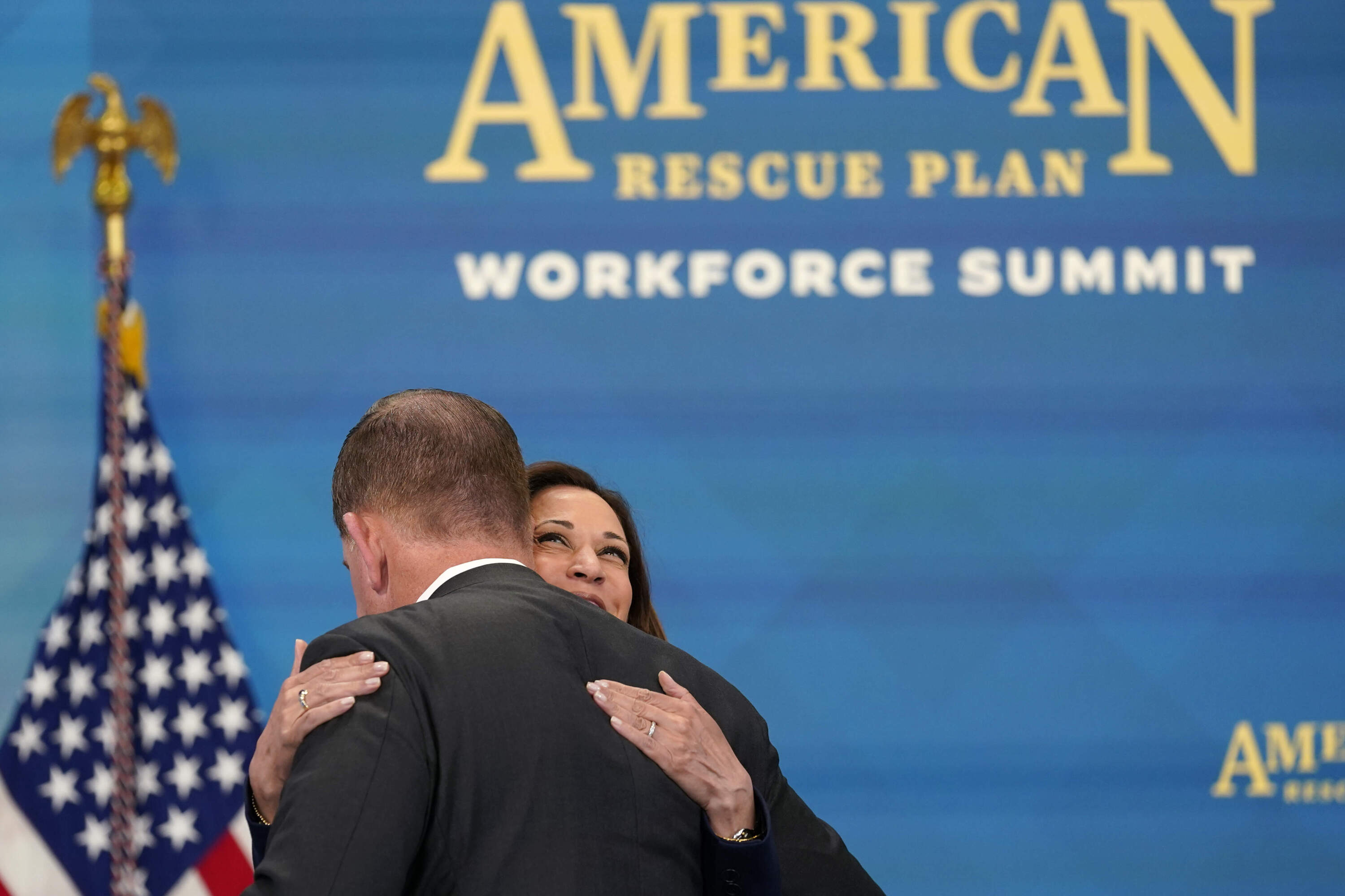Vice President Kamala Harris hugs then-Labor Secretary Marty Walsh during the American Rescue Plan Workforce Summit in Washington, Wednesday, July 13, 2022. (Susan Walsh/AP)
