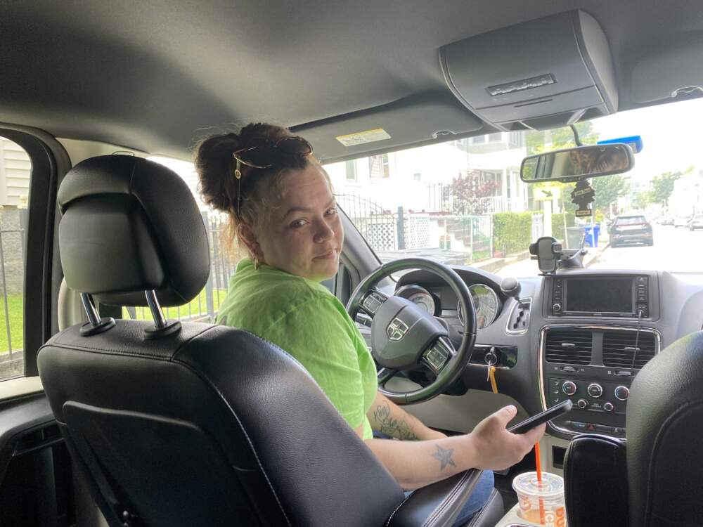 Felicia Corrado, a youth worker for Roca Boston, spends most of her days on the road going to visit her clients, who are all young women. (Deborah Becker/WBUR)