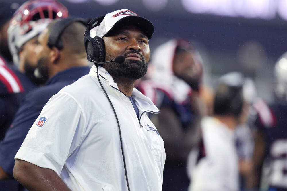 New England Patriots head coach Jerod Mayo watches a replay during the first half of a preseason NFL football game against the Carolina Panthers, Thursday, Aug. 8, 2024, in Foxborough, Mass. (Michael Dwyer/AP)