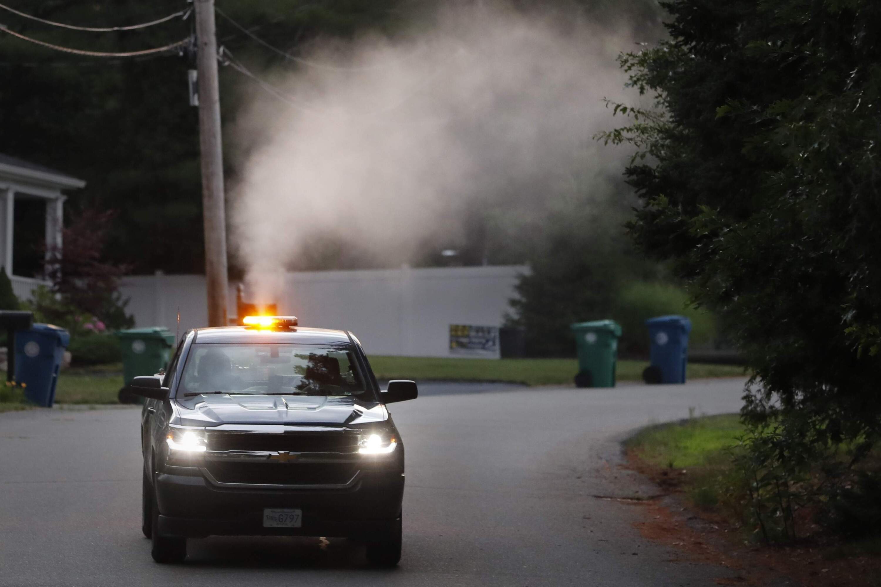 A crew from the East Middlesex Mosquito Control Project spray to control mosquitos from a pick-up truck on Wednesday, July 8, 2020. (Charles Krupa/AP)