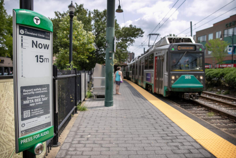 An MBTA real time arrivals display at Coolidge Corner shows one train arriving now, and another in 15 minutes. (Robin Lubbock/WBUR)