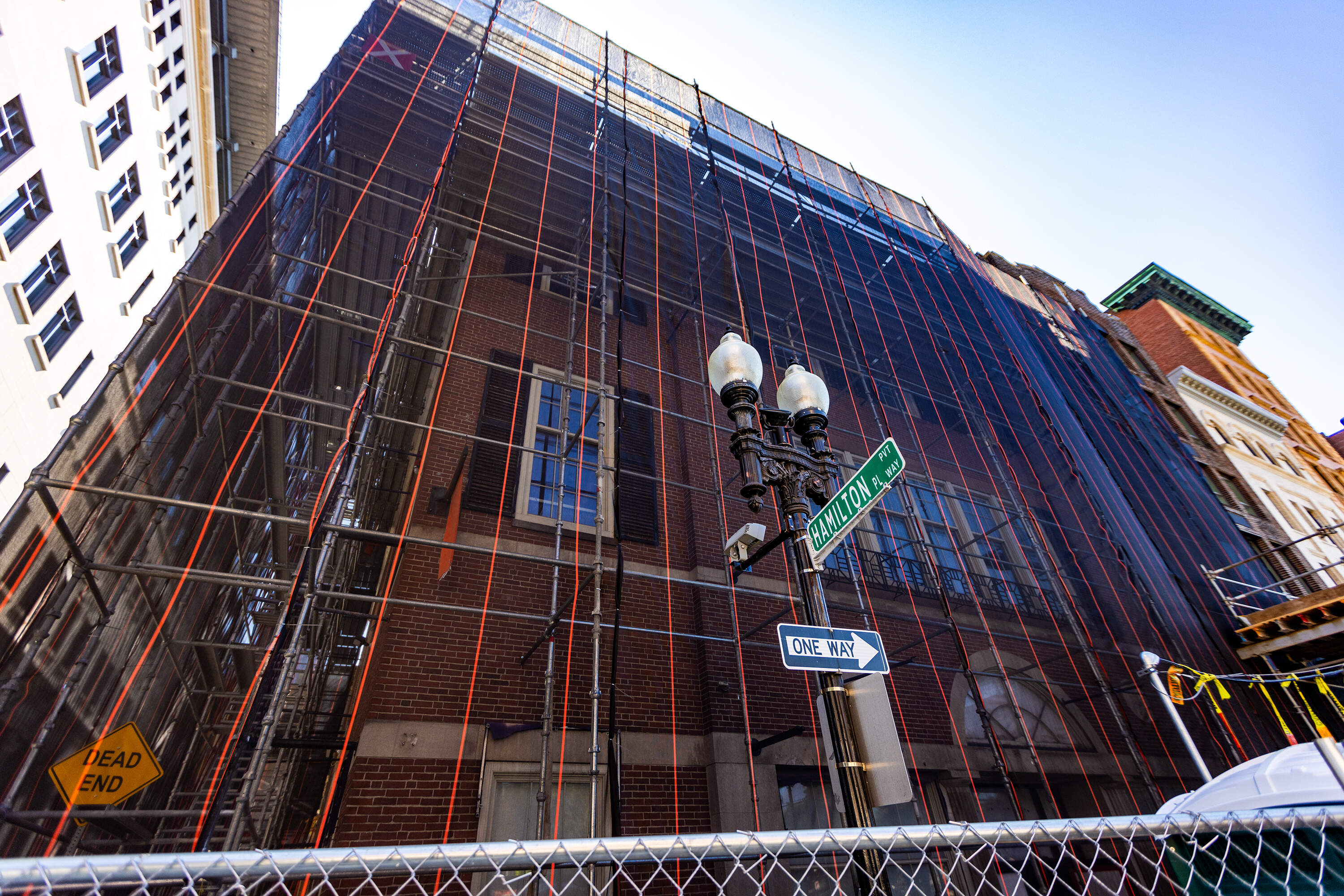 Scaffolding around the facade of the building that will host the city's new Holocaust Museum. (Jesse Costa/WBUR)