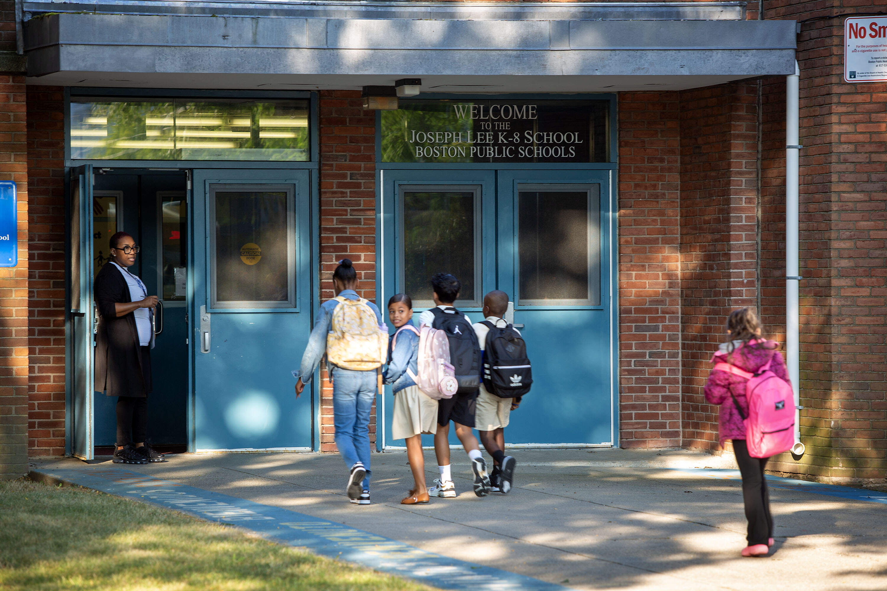 Students arrive for the first day of school at the Joseph Lee School in Dorchester. (Robin Lubbock/WBUR)