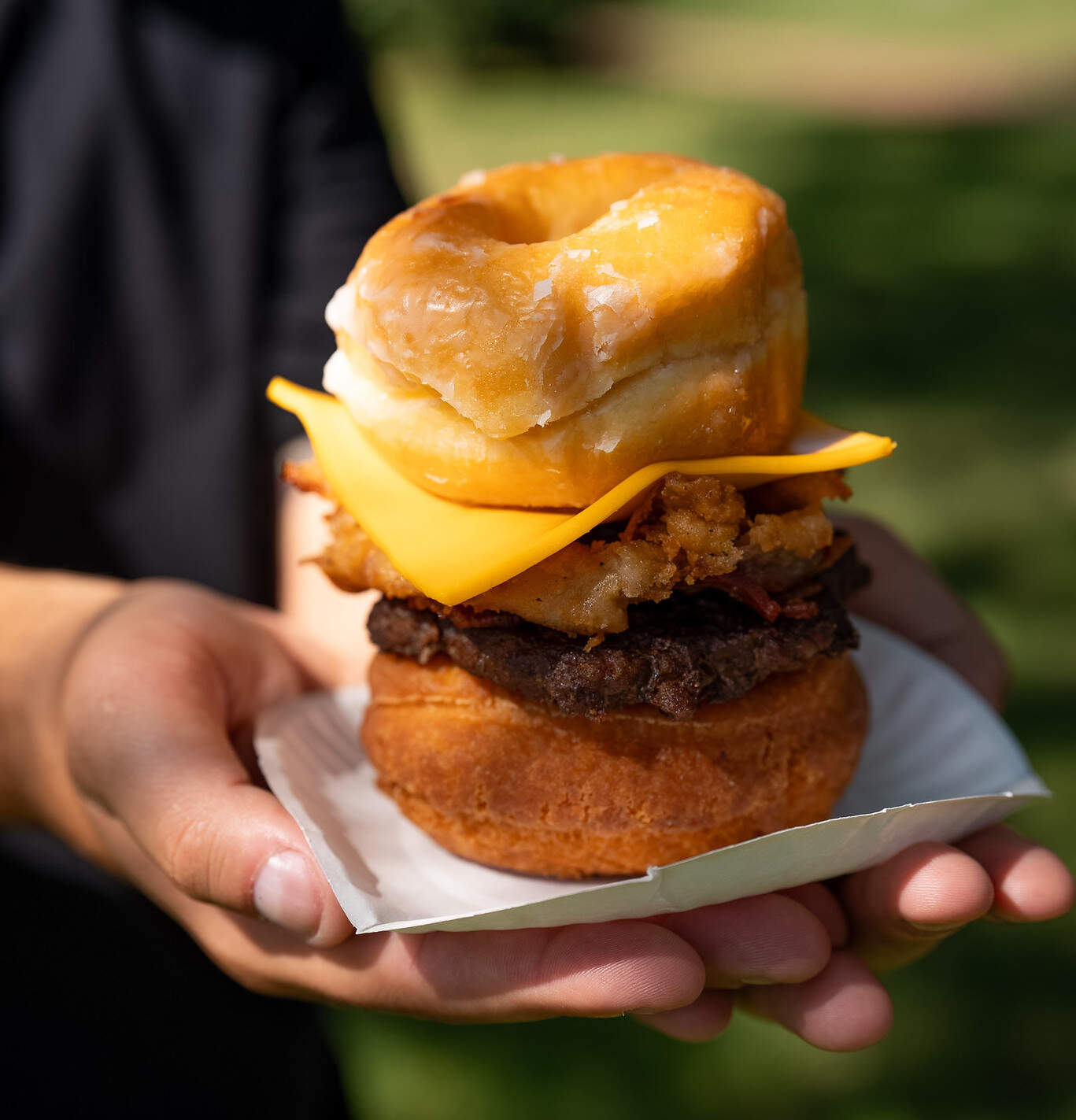 The new Craz-E burger, made with two doughnuts. (Photo courtesy of The Big E)
