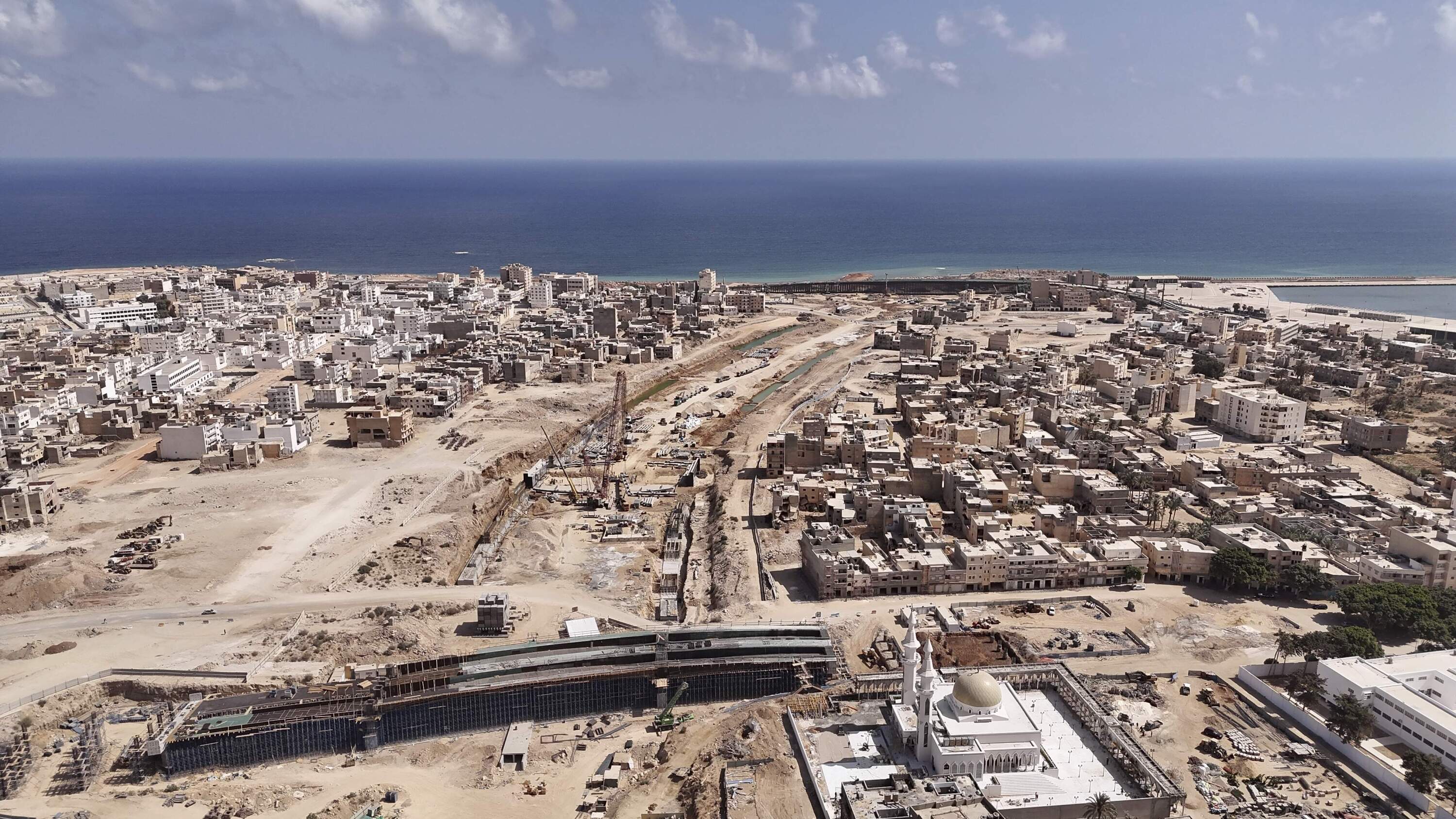 An aerial shot shows bridge construction in the city of Derna, Libya on Sept. 7, 2024. (Muhammad Elalwany/AP)