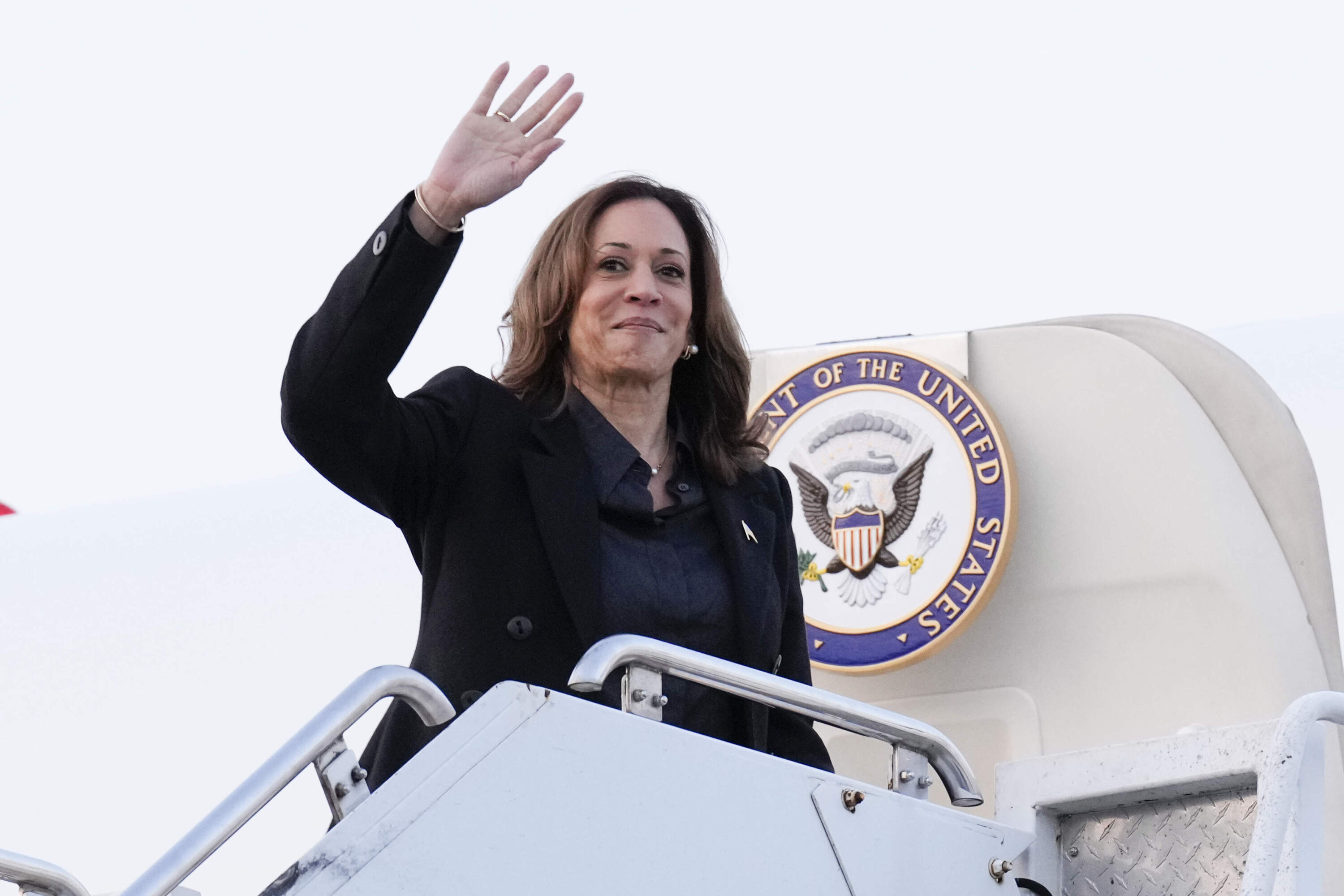 Democratic presidential nominee Vice President Kamala Harris waves as she boards Air Force Two to depart Wilkes-Barre Scranton International Airport, in Scranton, Pennsylvania. (Jacquelyn Martin/AP)