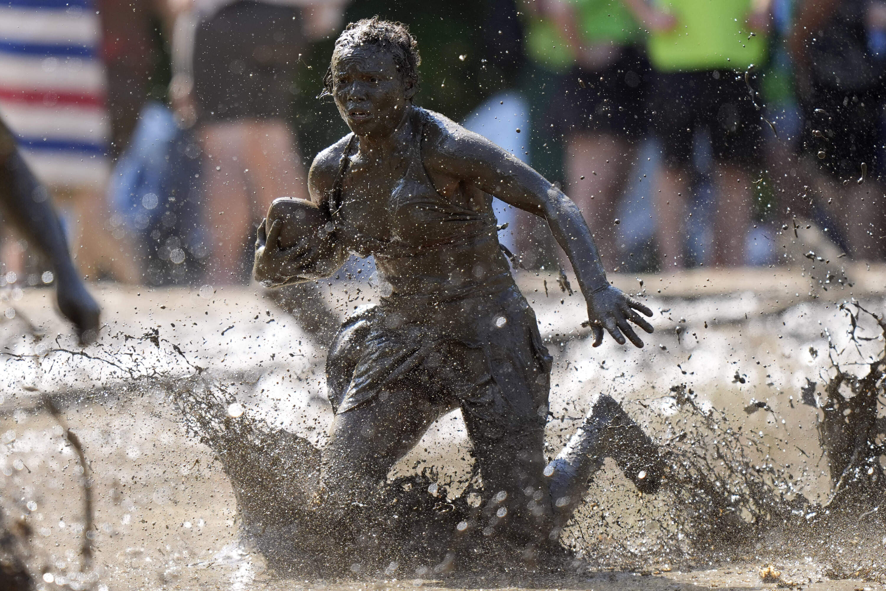 Mahala Smith, of Sabattus, Maine, scrambles for yardage. (Robert F. Bukaty/AP)
