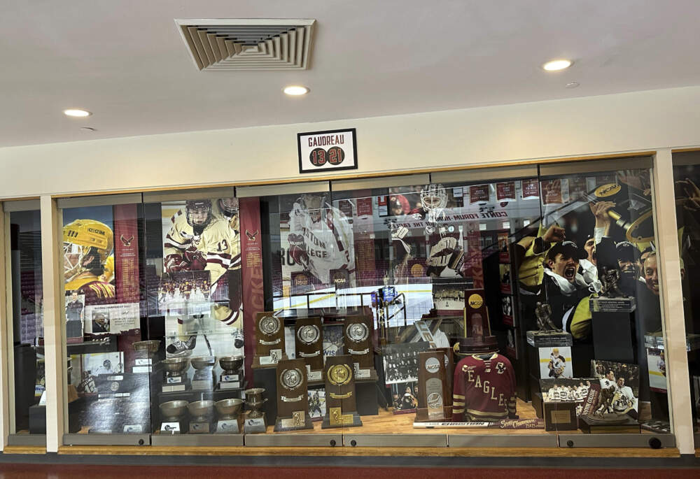 A sign hangs above the trophy case at Boston College's Conte Forum mourning the deaths of former Eagles hockey players Johnny and Matthew Gaudreau in Boston, Wednesday, Sept. 4, 2024. (Jimmy Golen/AP)
