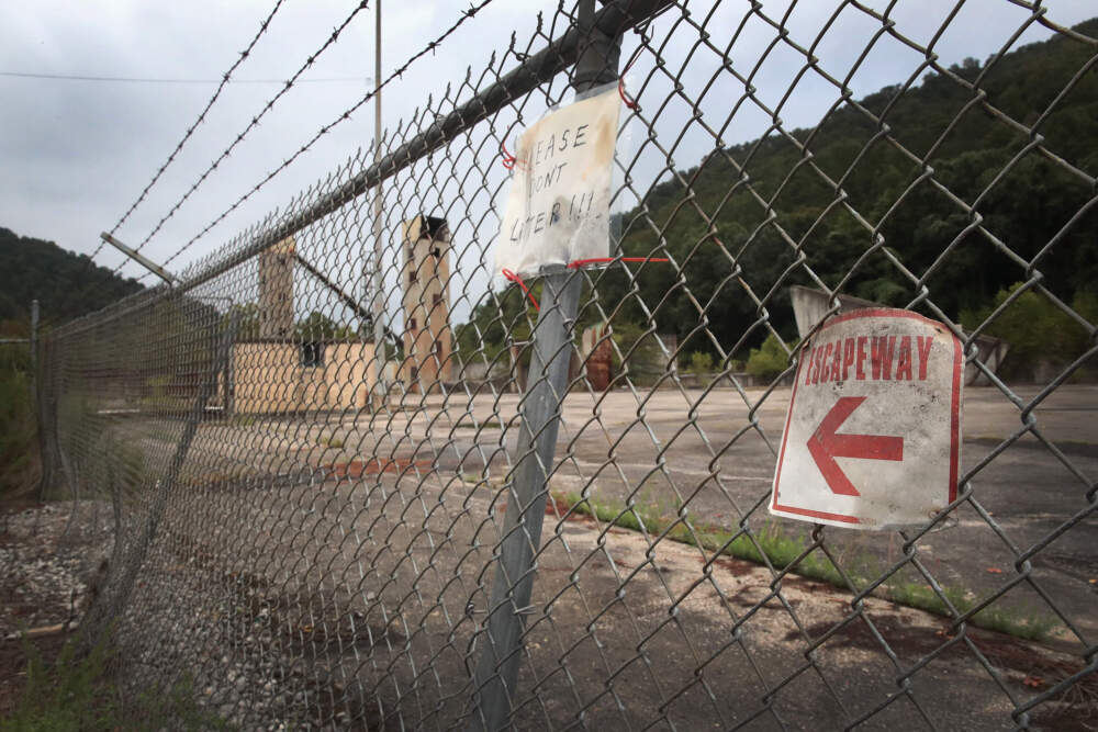 A fence surrounds the remains of a shuttered coal mine on Aug. 23, 2019 near Whitesburg, Kentucky. Many communities in Eastern Kentucky that rely heavily on a coal economy are seeing that lifeblood rapidly slip away. (Scott Olson/Getty Images)