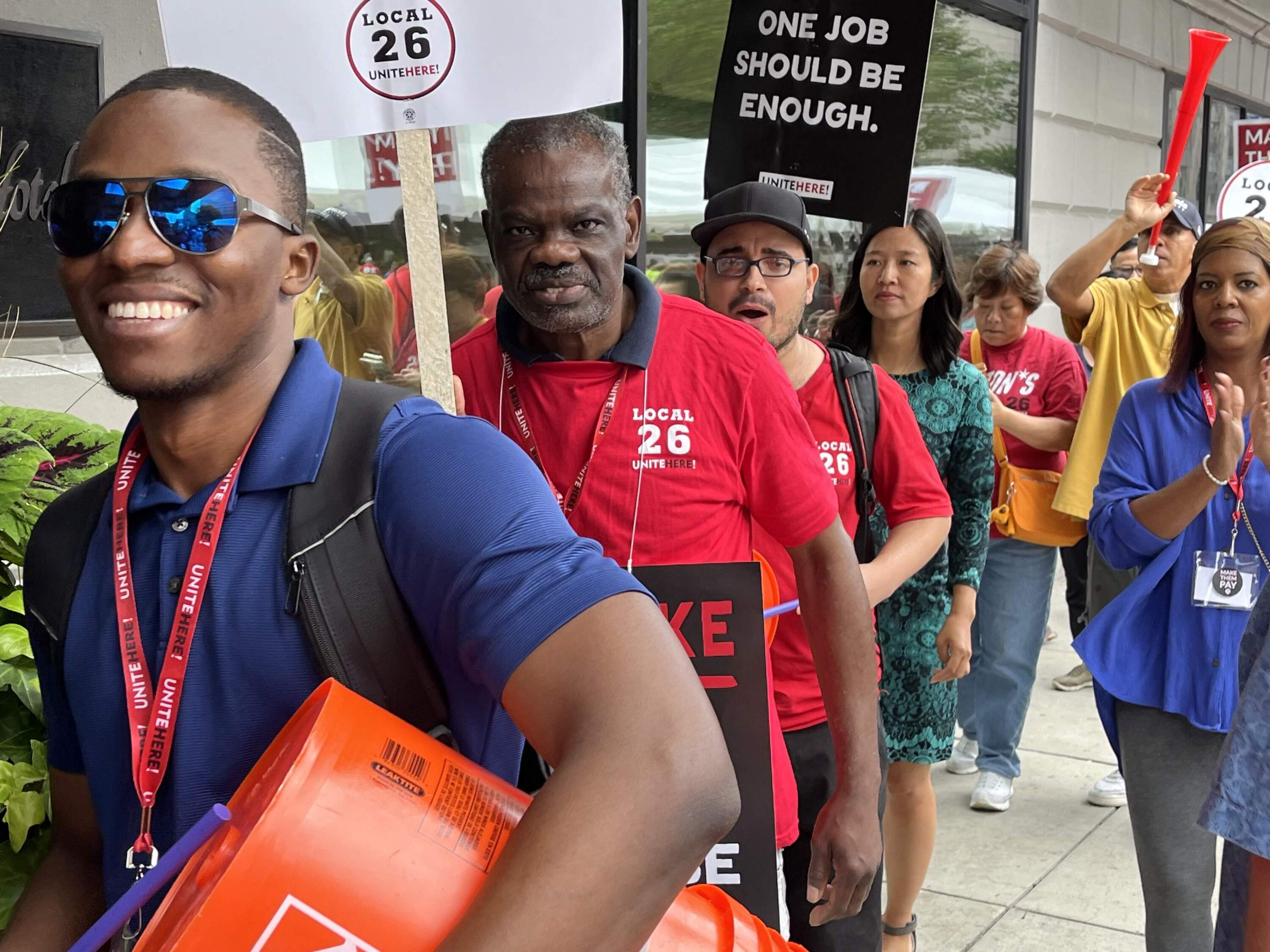 Boston Mayor Michelle Wu joined the picket line of striking hotel workers Monday morning. (Barbara Moran/WBUR)