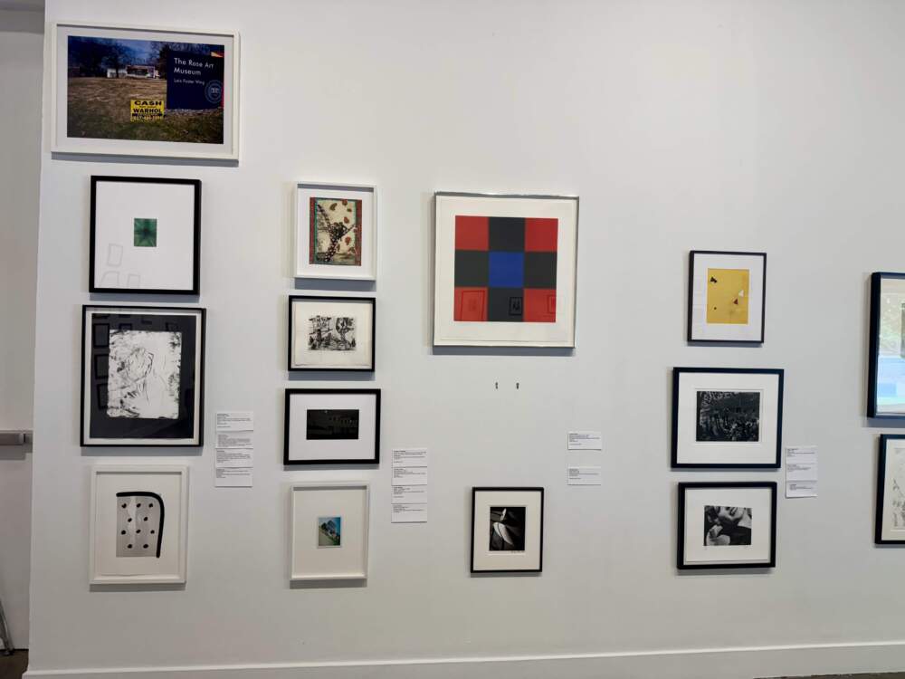 A wall at MIT’s List Visual Arts Center where students already removed work to take home. (By Maddie Browning)