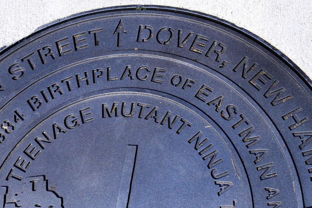 A city manhole cover, noting the Dover, New Hampshire birthplace of the Teenage Mutant Ninja Turtles, is seen at the outside the property in Dover. (Charles Krupa/AP)