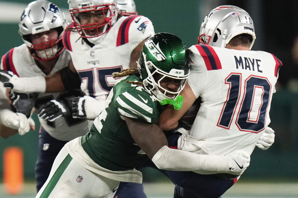 New York Jets linebacker Jamien Sherwood (44) sacks New England Patriots quarterback Drake Maye (10) during the fourth quarter of an NFL football game, Thursday, Sept. 19, 2024, in East Rutherford, N.J. (Seth Wenig/AP)