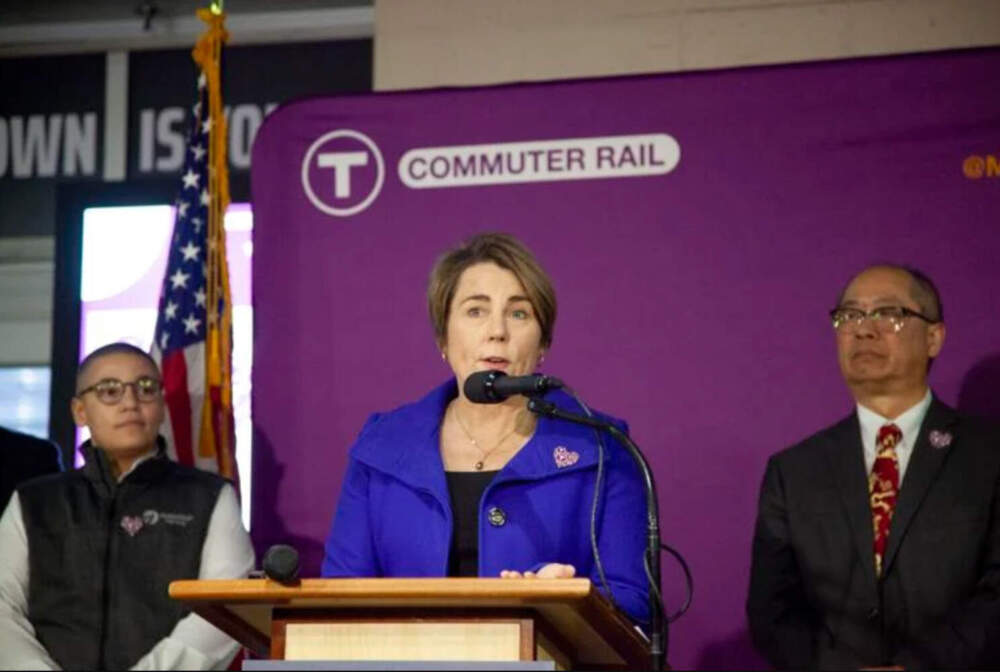 Gov. Maura Healey speaks at a press conference at North Station, flanked by Transportation Secretary Monica Tibbits-Nutt (left) and MBTA General Manager Phil Eng (right). (Chris Lisinski/SHNS)