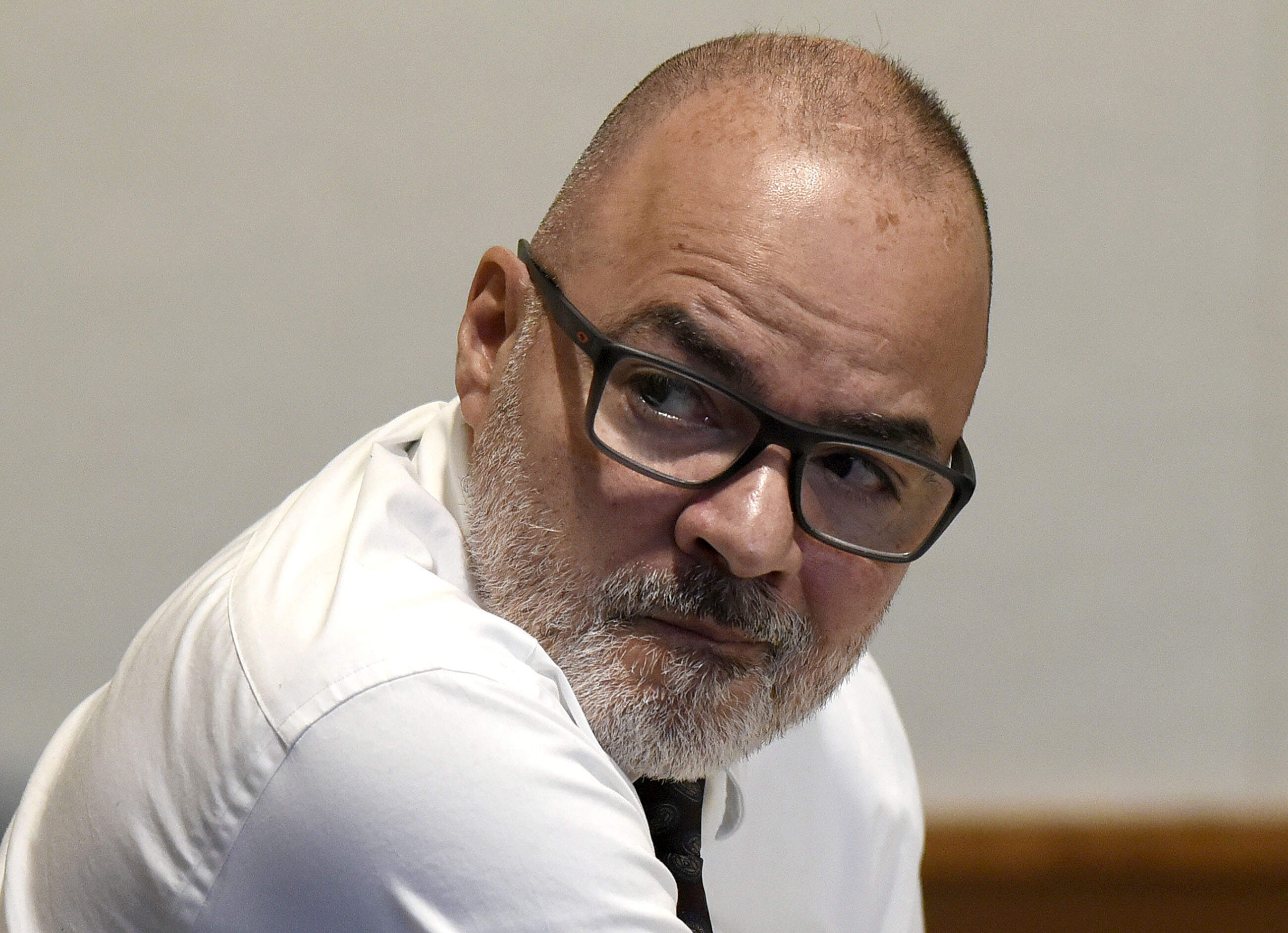 Victor Malavet looks behind him during his trial at Merrimack County Superior Court in Concord, N.H., on Aug. 26. (David Lane/Union Leader via AP pool)
