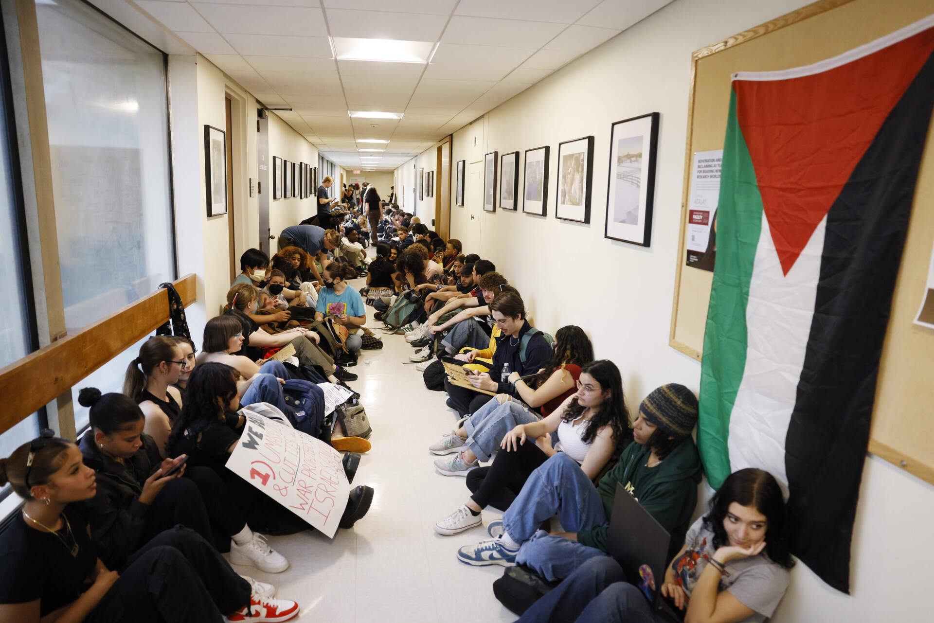 UMass Amherst students stage a sit-in last year inside the Whitmore Administrative Building after presenting demands to the chancellor to end what they called, "UMass Amherst's ties with war profiteers" and add to growing calls on college campuses for a cease-fire in the war in Gaza". (Jessica Rinaldi/The Boston Globe via Getty Images)