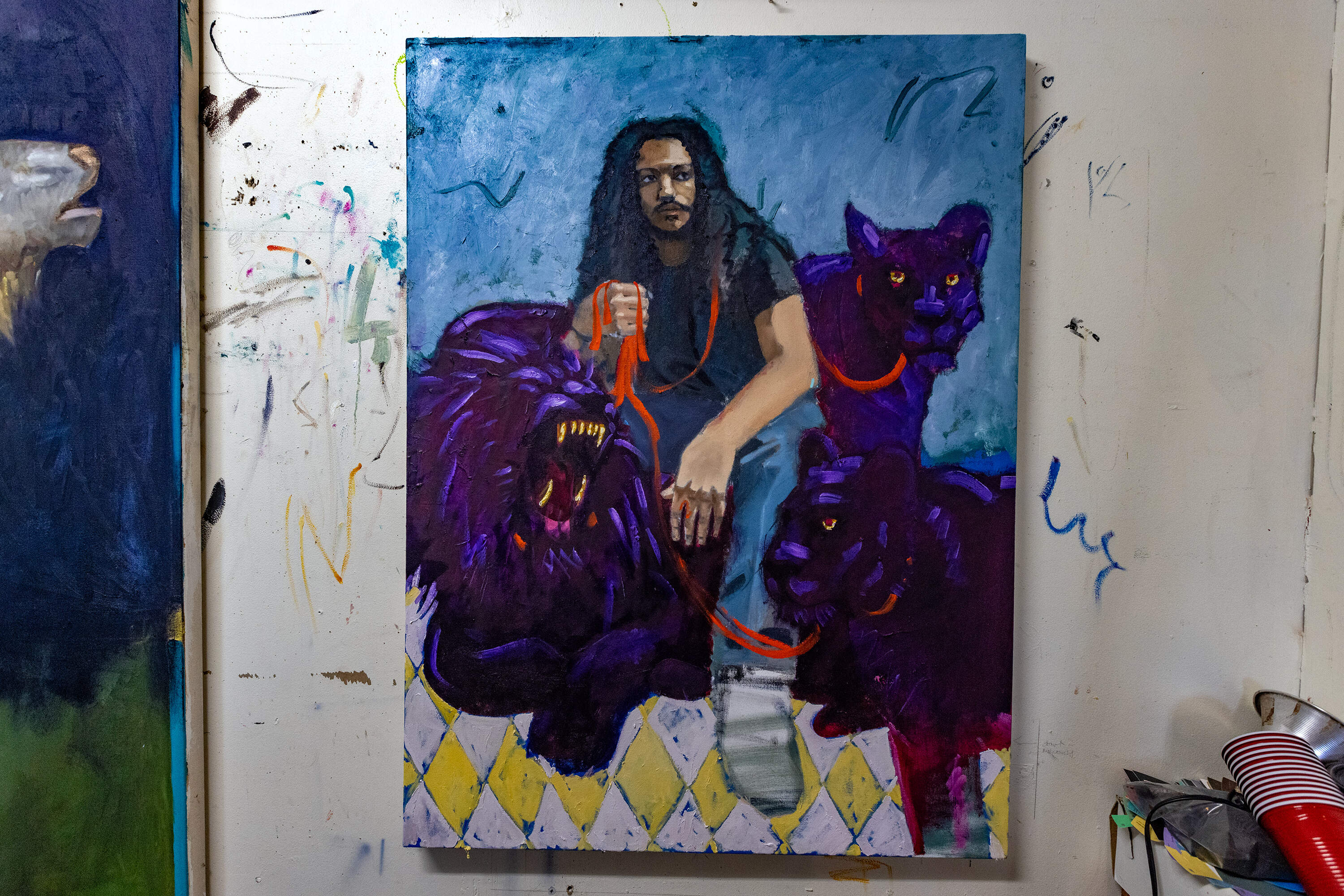 One of Jameel Radcliffe's portraits hanging in his studio at the Boston Center for the Arts. (Jesse Costa/WBUR)