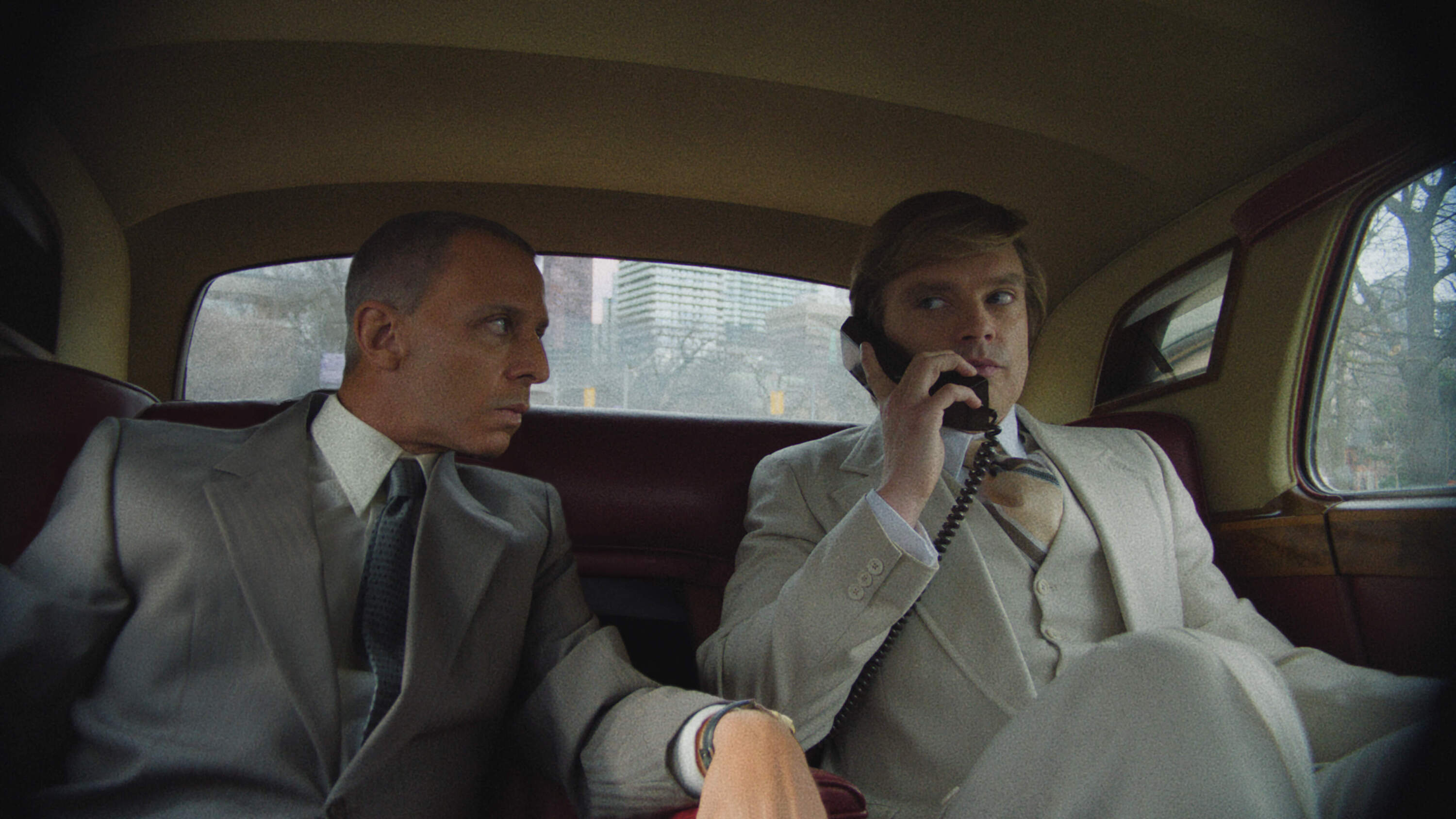 From left: Jeremy Strong as Roy Cohn and Sebastian Stan as Donald Trump in director Ali Abbasi's "The Apprentice." (Courtesy Pief Weyman)