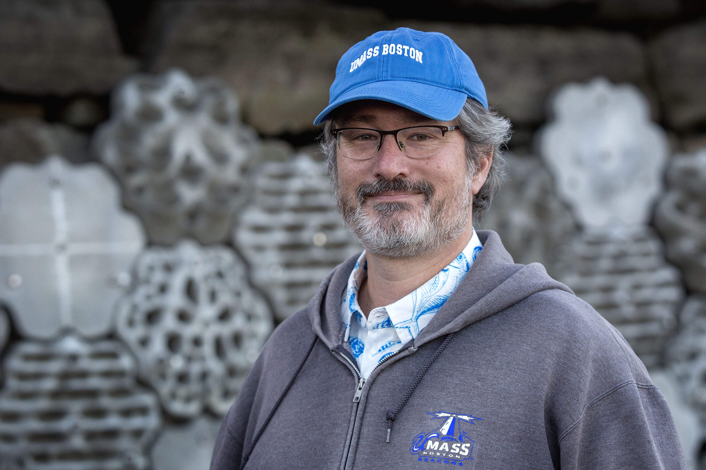 Jarrett Byrnes, a professor in the Biology department at University of Massachusetts, Boston, near the new living seawall at the Condor Street Urban Wild in East Boston. (Robin Lubbock/WBUR)