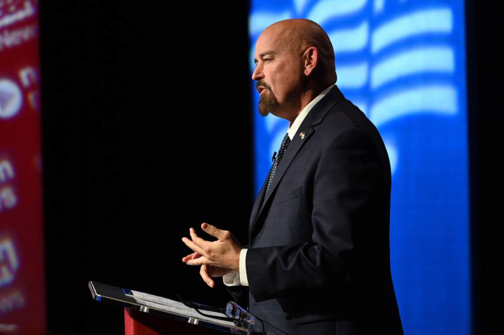 Republican candidate John Deaton speaks during a debate against Sen. Elizabeth Warren. (Meredith Nierman/GBH News)