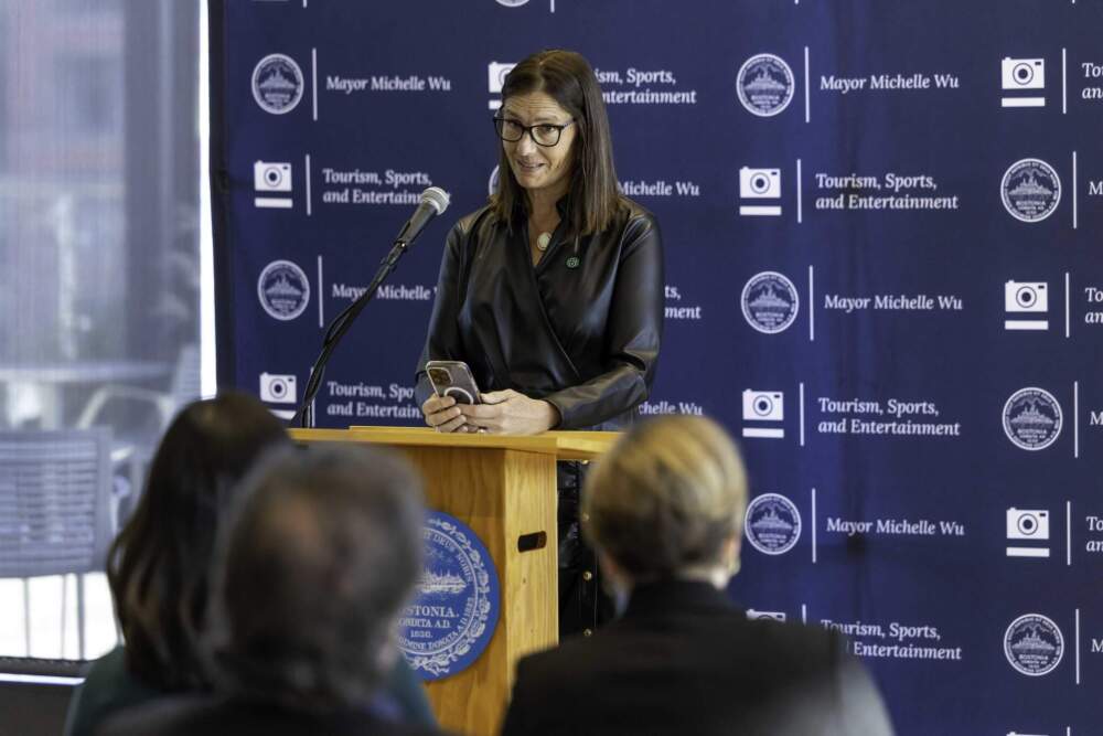 Jeannine Russell speaks about her late husband at the bridge re-naming ceremony. (Courtesy of Mike Mejia from the City of Boston)
