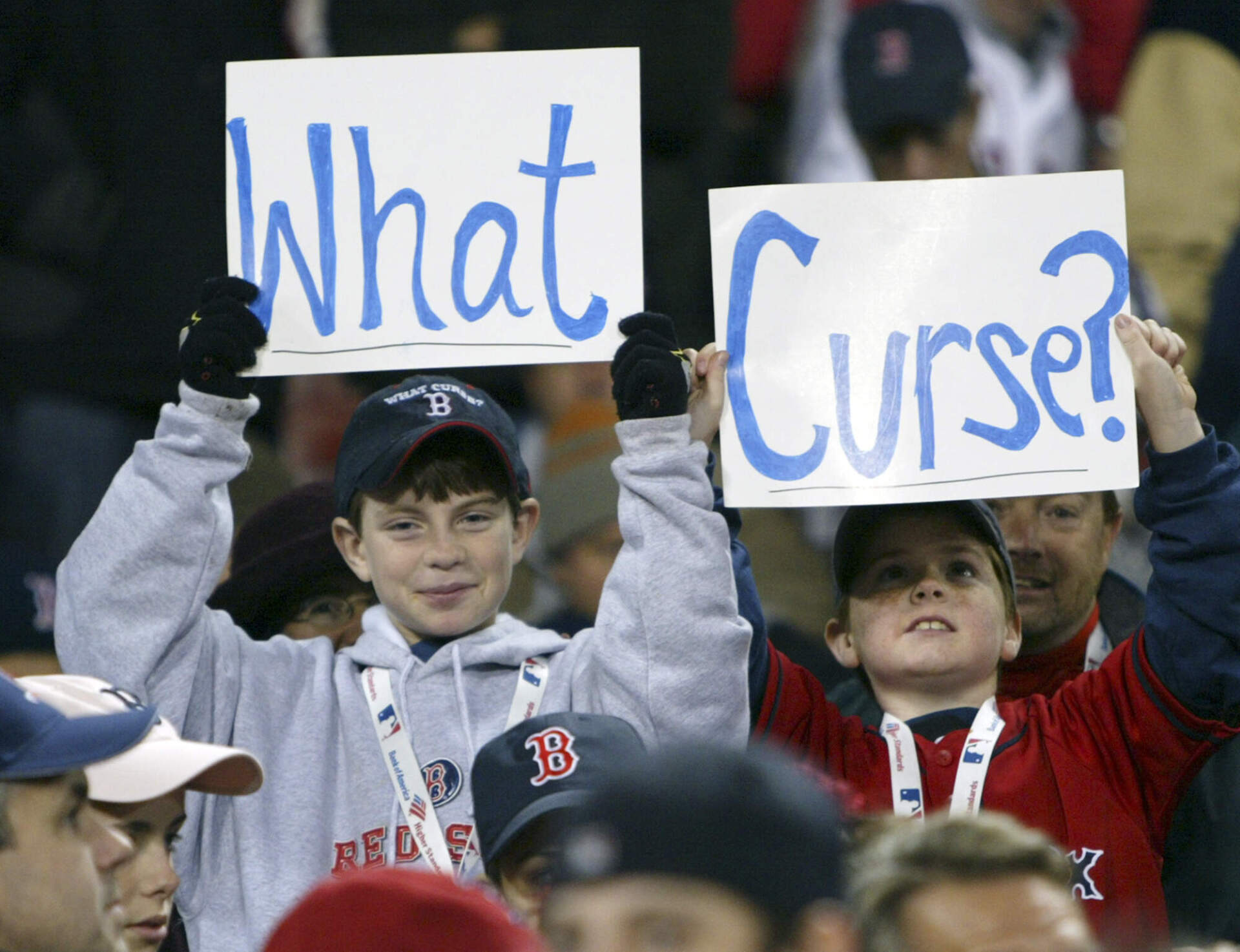 Boston Red Sox fans hold up signs prior to the beginning of Game 1 of the World Series, Saturday, Oct. 23, 2004, at Boston's Fenway Park. (Winslow Townson/AP)