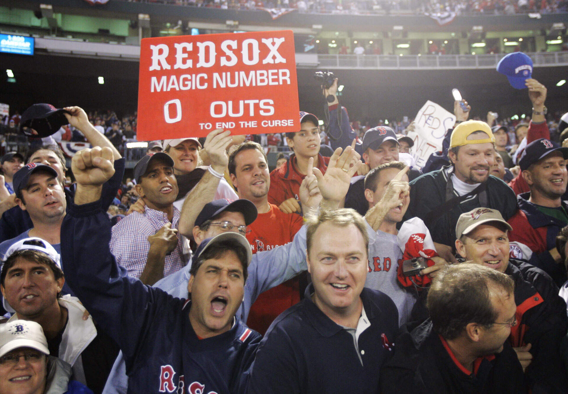 Boston Red Sox fans celebrate the Red Sox 3-0 win over the St. Louis Cardinals to sweep the World Series Wednesday, Oct. 27, 2004, in St. Louis. (Al Behrman/AP)