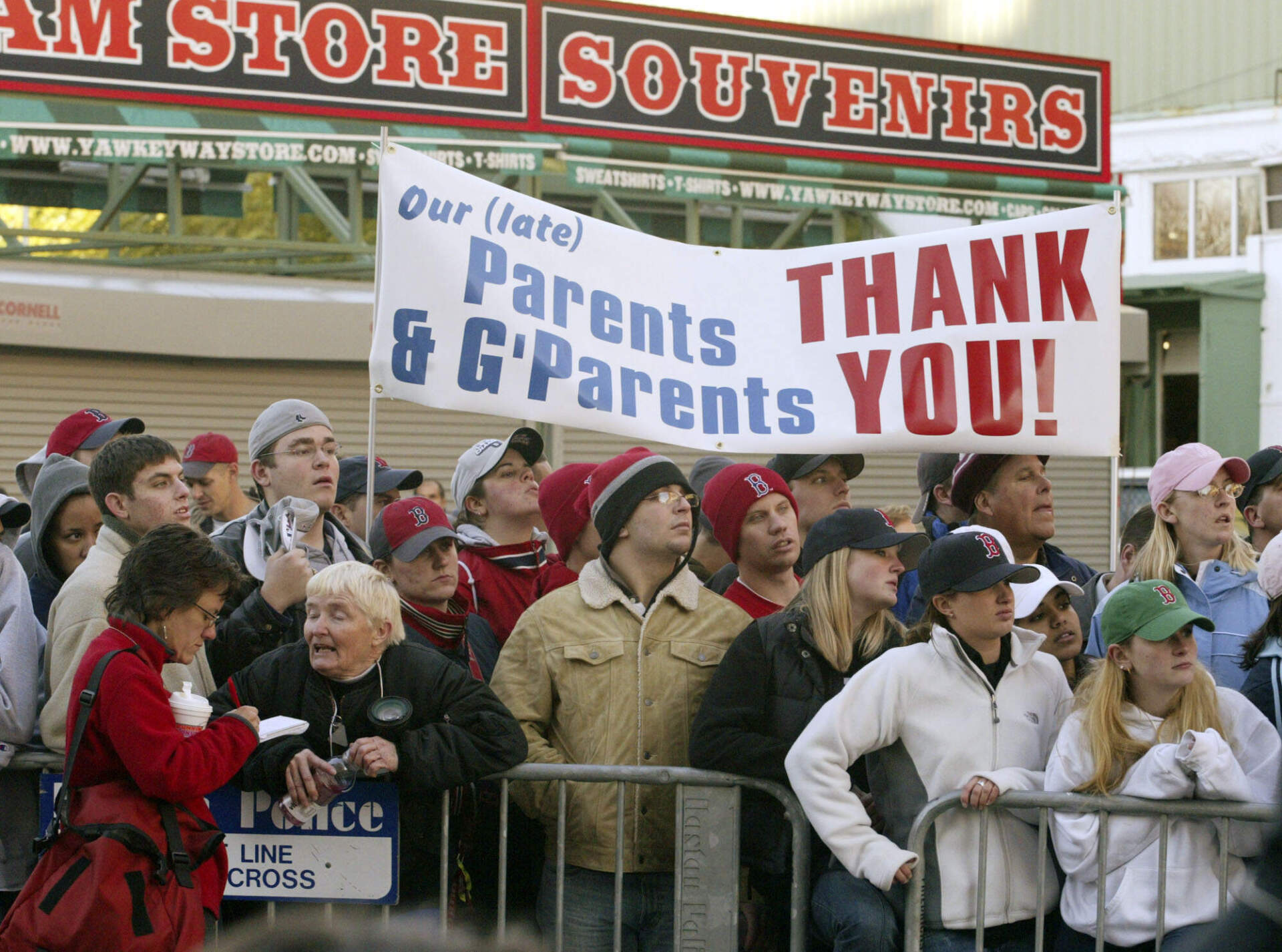 Faithful Red Sox fans gather around Fenway Park in Boston early Thursday morning Oct. 28, 2004 waiting for their triumphant team to return home.(Bizuayehu Tesfaye/AP)