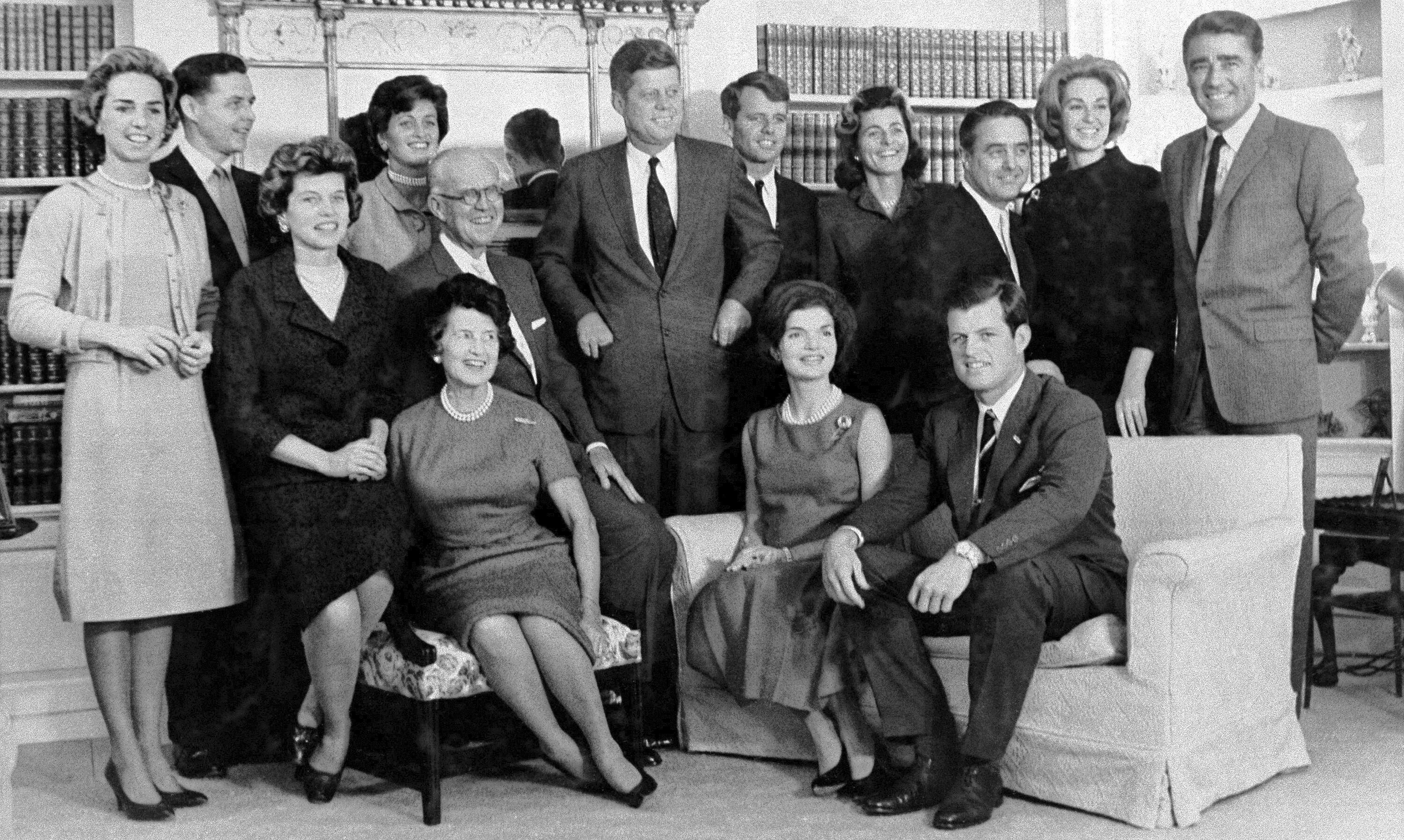 In this December, 1960, file photo, then President-elect John F. Kennedy, standing at center, is surrounded by members of his family in home of his parents in Hyannis Port, Mass. Standing, left to right, are Ethel Kennedy, wife of Robert Kennedy; Steven Smith and wife Jean Kennedy Smith; Robert Kennedy; Patricia Kennedy Lawford; Sargent Shriver, Joan Kennedy, wife of Edward Kennedy; and Peter Lawford. Foreground, left to right: Eunice Kennedy Shriver, Joseph P. Kennedy and wife Rose Kennedy seated in front; Jacqueline Kennedy; and Edward Kennedy. (AP photo)