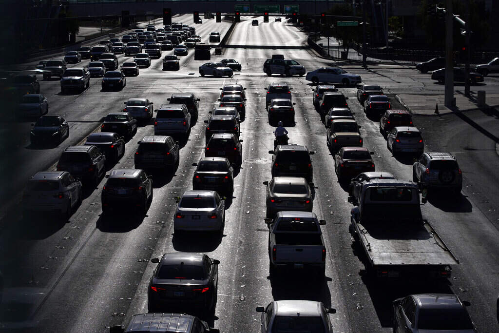 Cars wait at a red light during rush hour at the Las Vegas Strip, in Las Vegas on Thursday, April 22, 2021. (John Locher/AP)