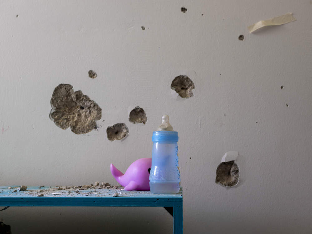 Bullet holes cover the bedroom wall of hostage Ariel Bibas, 4, in Kibbutz Nir Oz, Israel, on Friday, June 21, 2024. Ariel was kidnapped on Oct. 7, with his infant brother, Kfir, now 1, his mother, Shiri, and his father, Yarden. (Oded Balilty/AP)