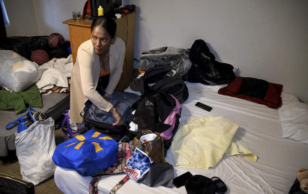 Sofia Roca, an immigrant from Colombia, packs up her belongings in Aurora, Colorado, on March 29, 2024, as she prepares to leave in search of work in another state. (Thomas Peipert/AP)