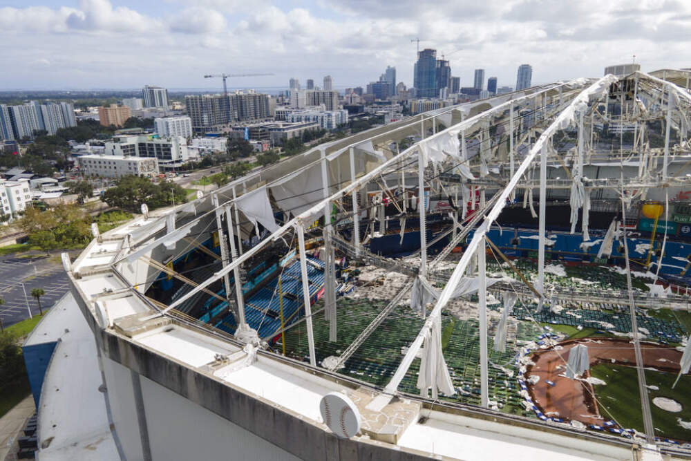 The tattered roof of the Tropicana Field in St. Petersburg, Florida the morning after Hurricane Milton hit the region. (Julio Cortez/AP)