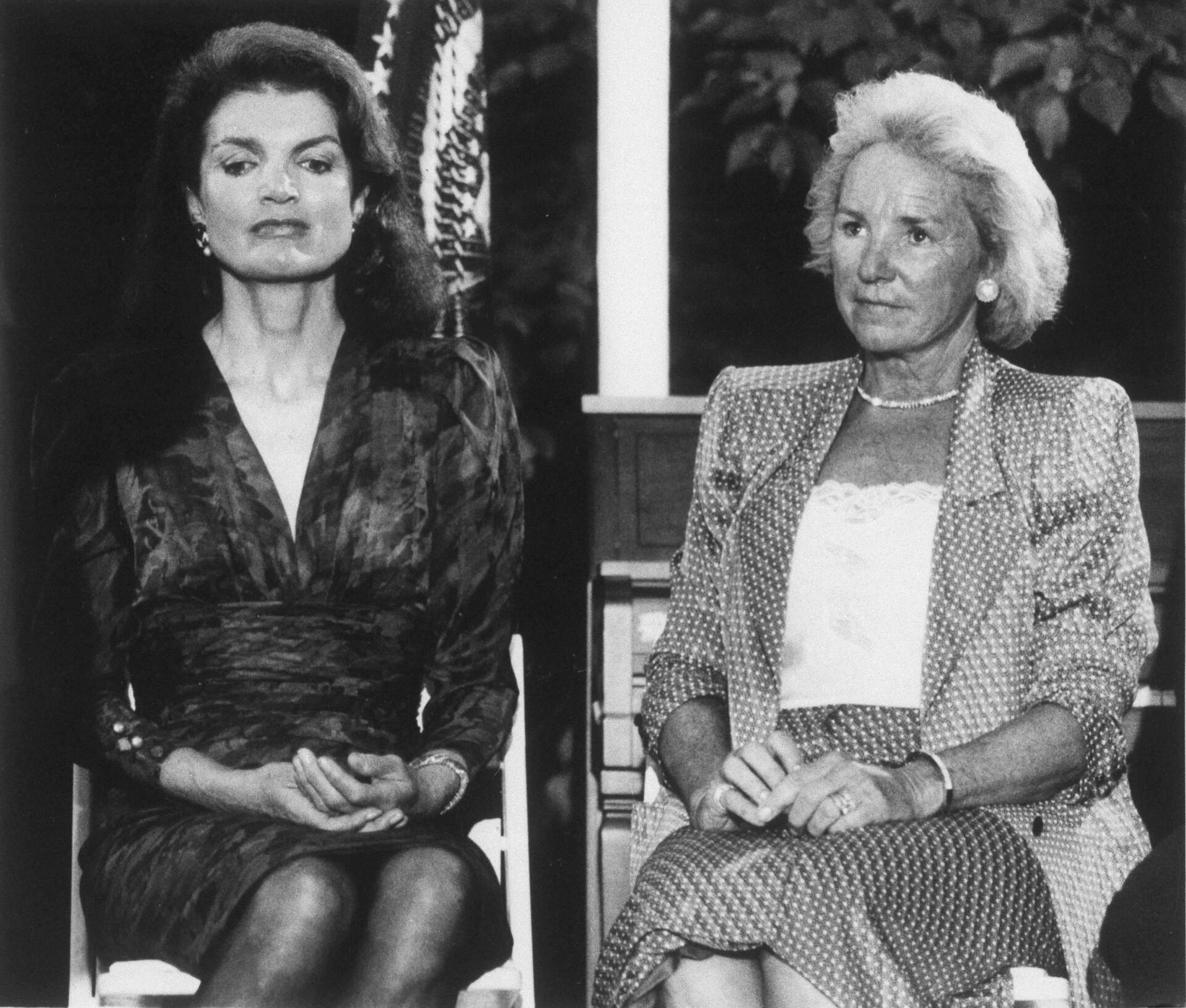 Jacqueline Kennedy Onassis, left, widow of the late president. John F. Kennedy and Ethel Kennedy listen to a speech by President Reagan during a fundraiser for the John F. Kennedy Memorial Library in 1985. (Charles Tasnadi/AP)