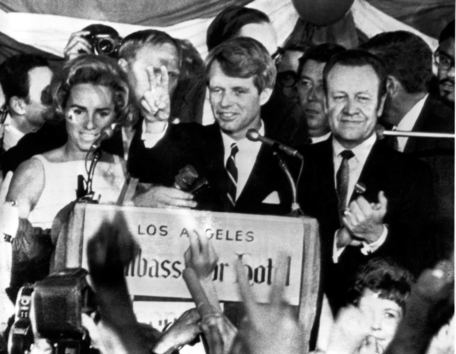 Senator Robert F. Kennedy speaks to campaign aides minutes before his assassination in 1968. (AP photo)