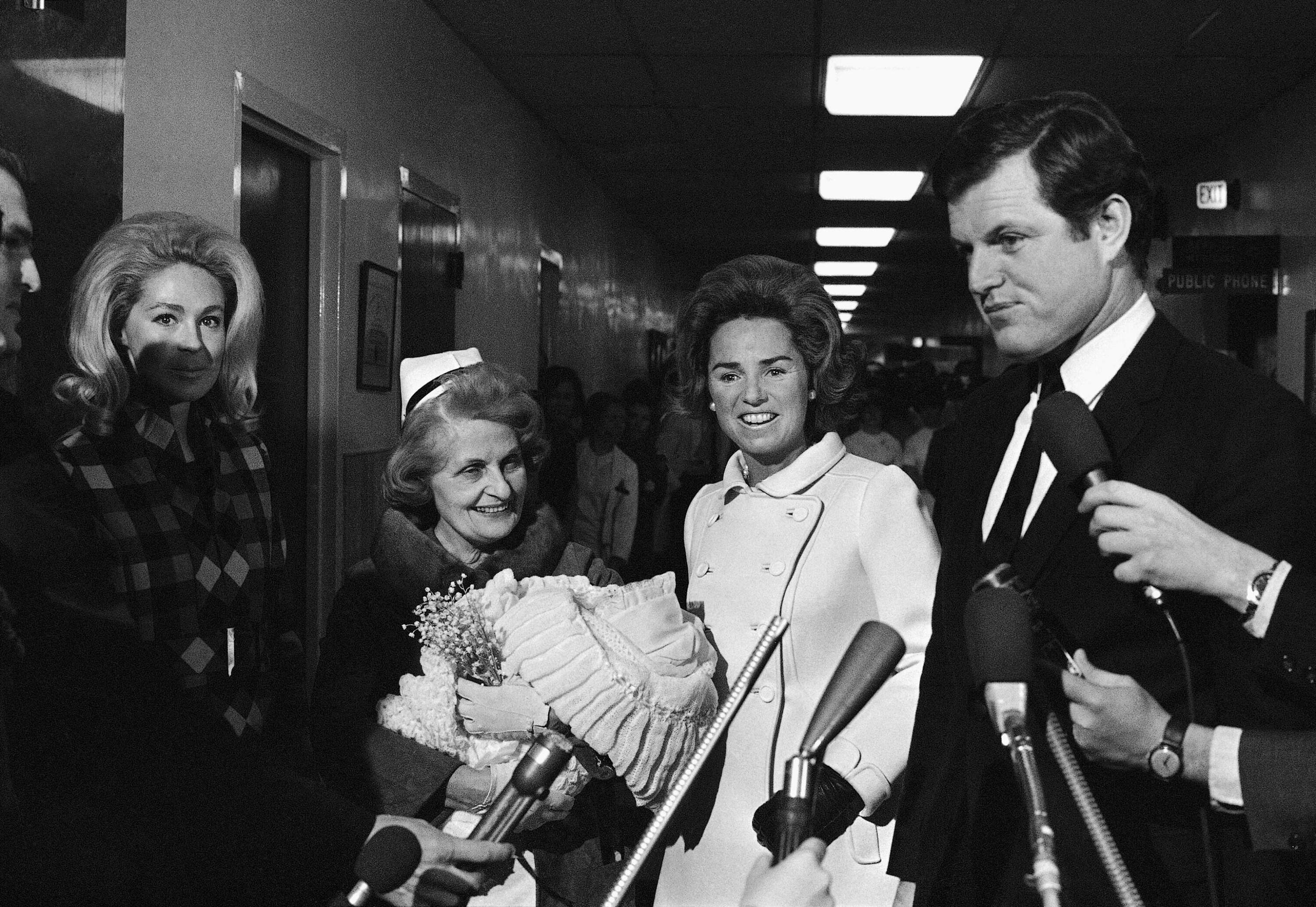 A joyful and proud Ethel Kennedy introduces her newborn daughter, Rory Elizabeth Catherine, her eleventh child. With her is her brother-in-law Edward M. Kennedy of Massachusetts. (AP photo)