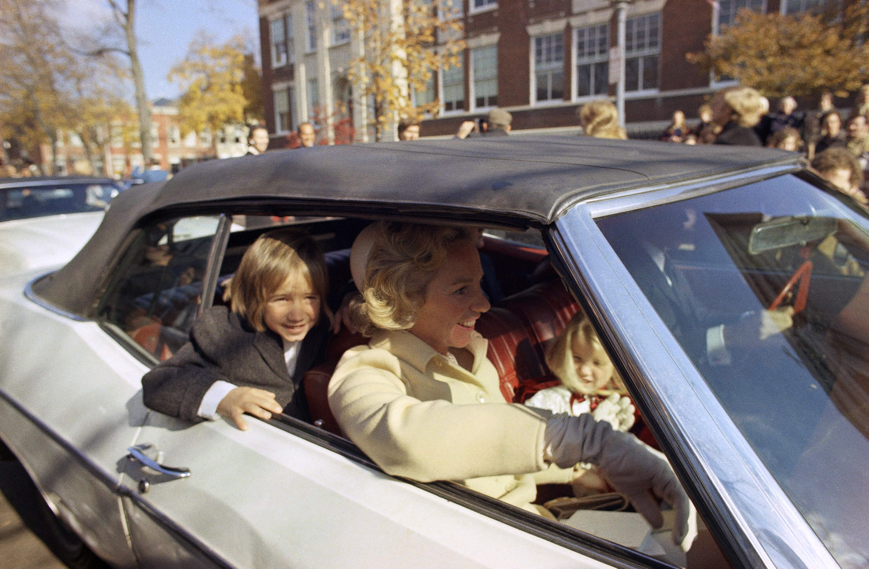 Ethel Kennedy some of her children sit in a car outside of Holy Trinity Church in Washington, D.C., the day of her daughter Kathleen's wedding to David Townsend in 1973. (AP photo)